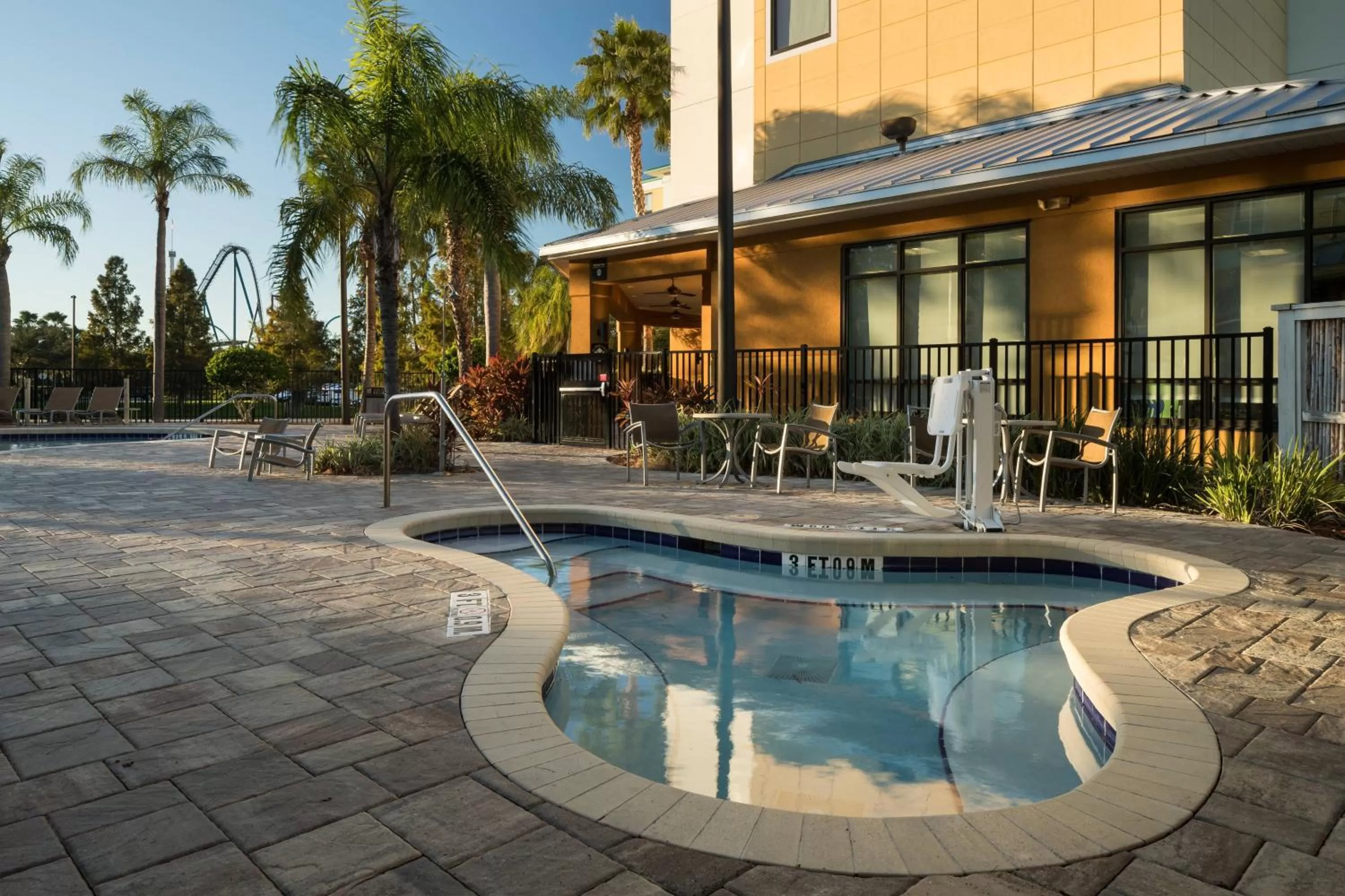 Swimming pool in Fairfield Inn Suites by Marriott Orlando At SeaWorld