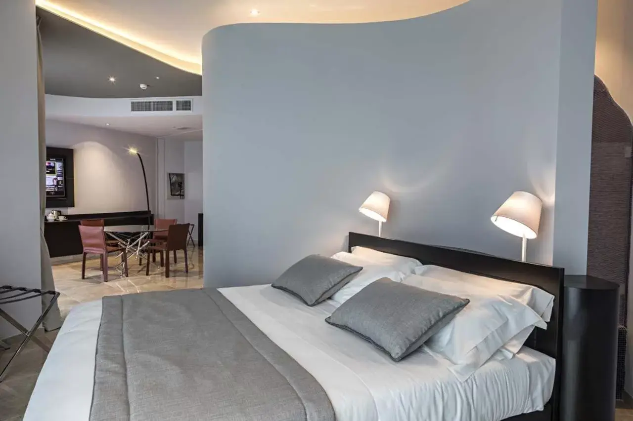 Living room, Bed in San Barbato Resort Spa & Golf