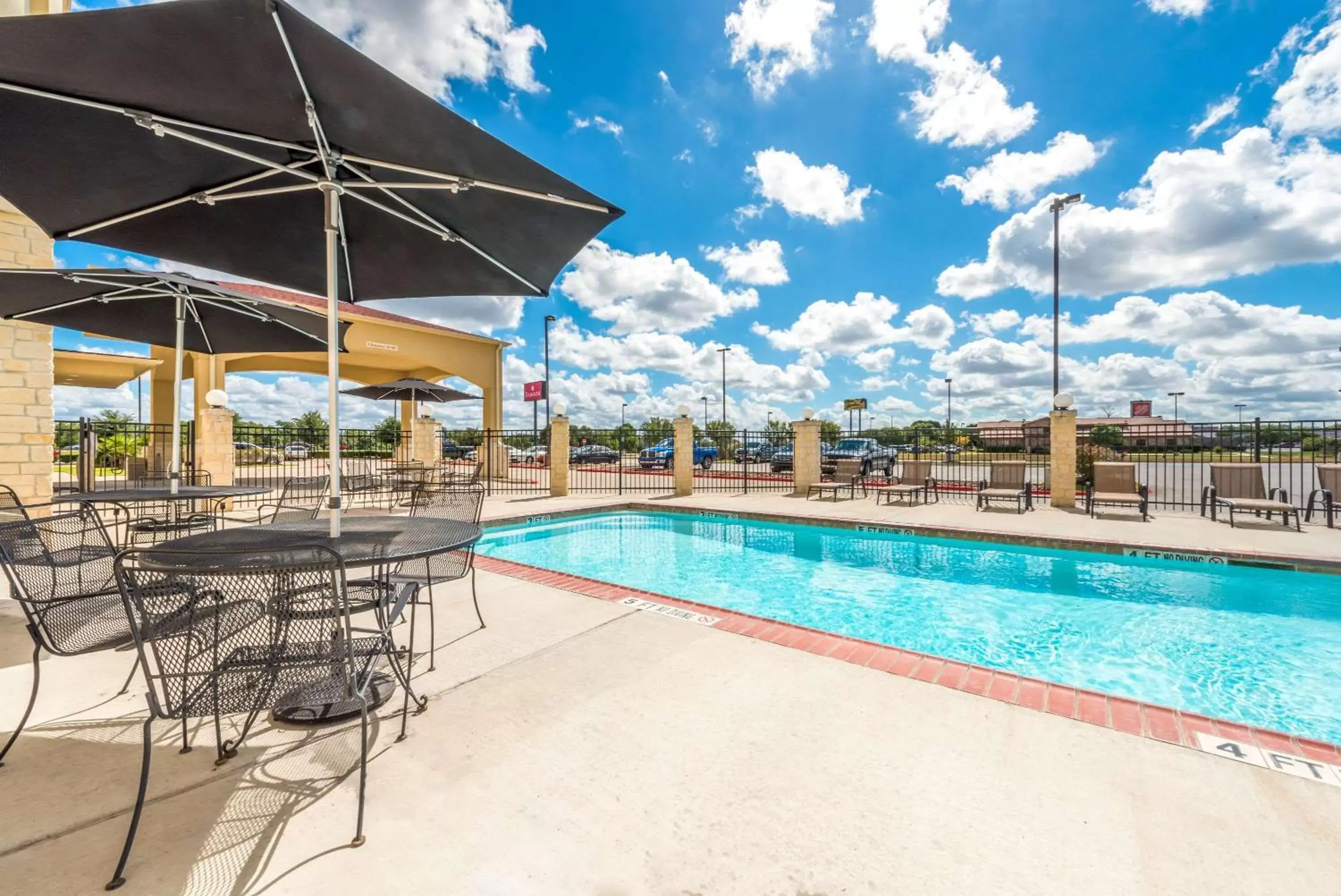 On site, Swimming Pool in Ramada by Wyndham College Station