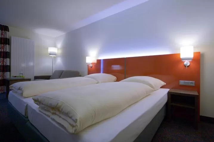 Bed in iQ-Hotel Ulm