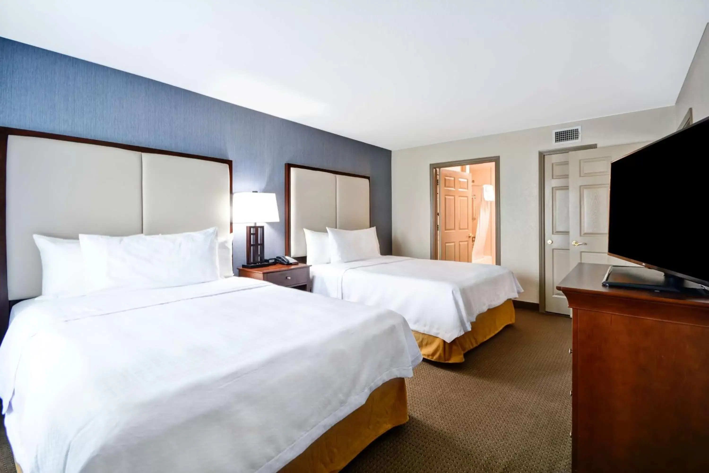 Bedroom in Homewood Suites by Hilton Dallas-Lewisville