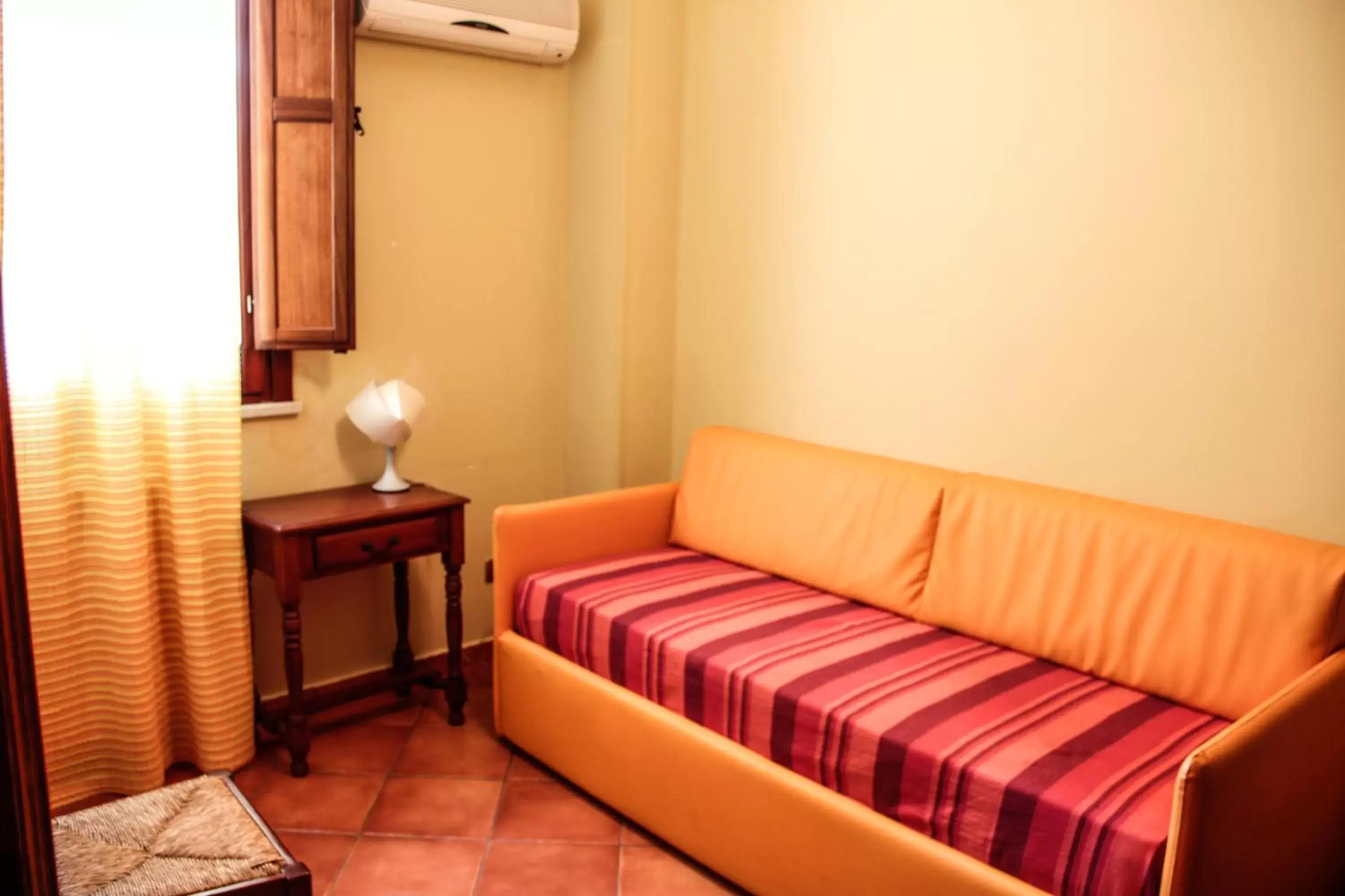 Bedroom, Seating Area in B&B Porta Bagni
