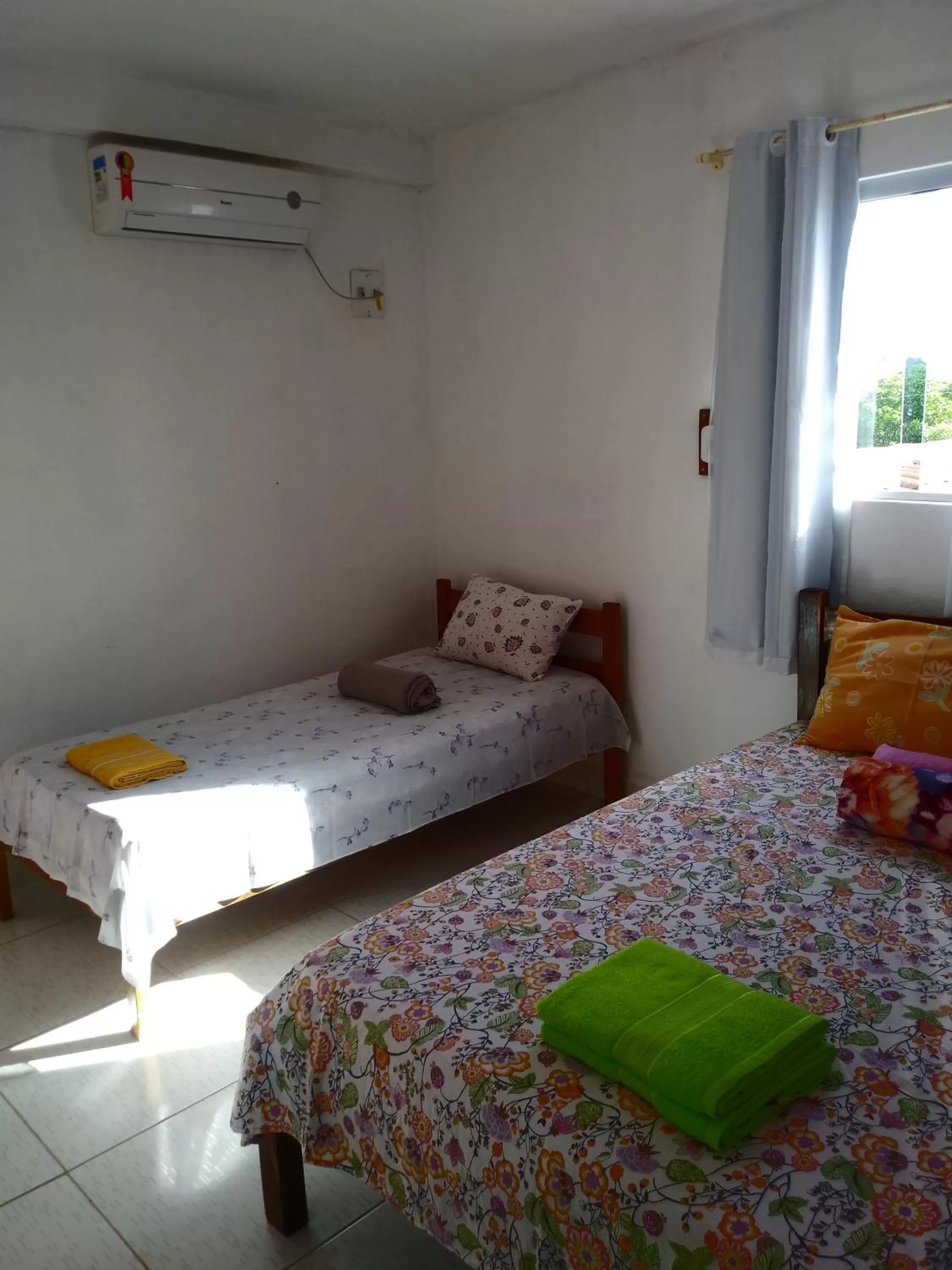 Bed in Pousada dos Ventos