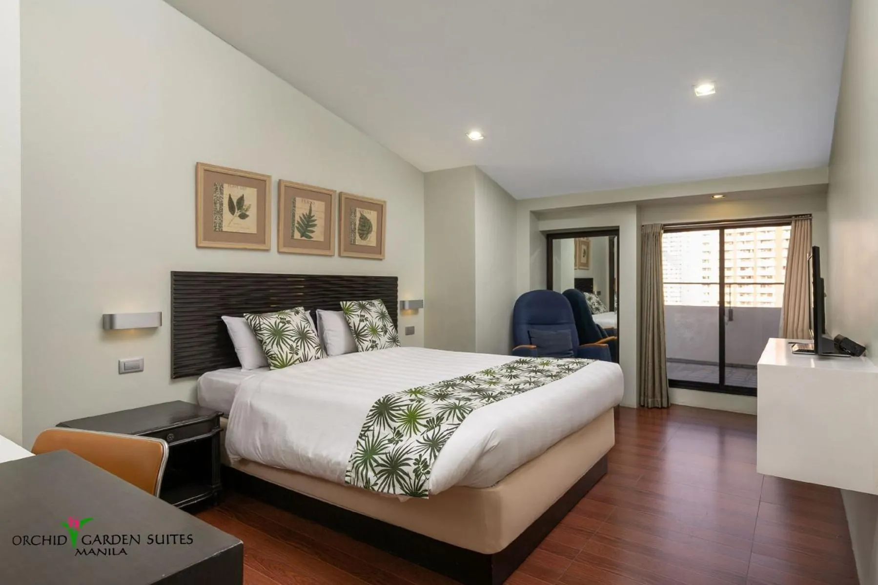 Photo of the whole room, Bed in Orchid Garden Suites