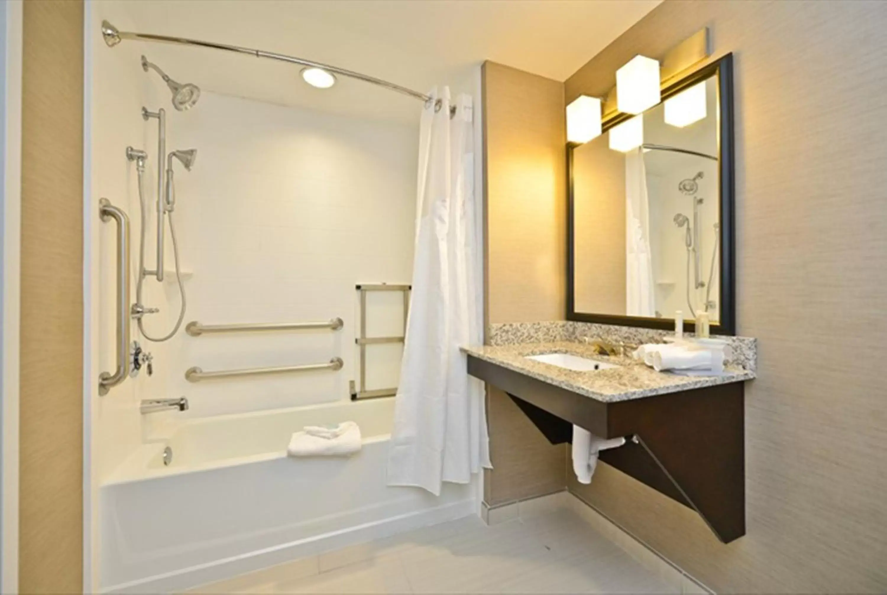 Bathroom in Holiday Inn Express & Suites Utica, an IHG Hotel