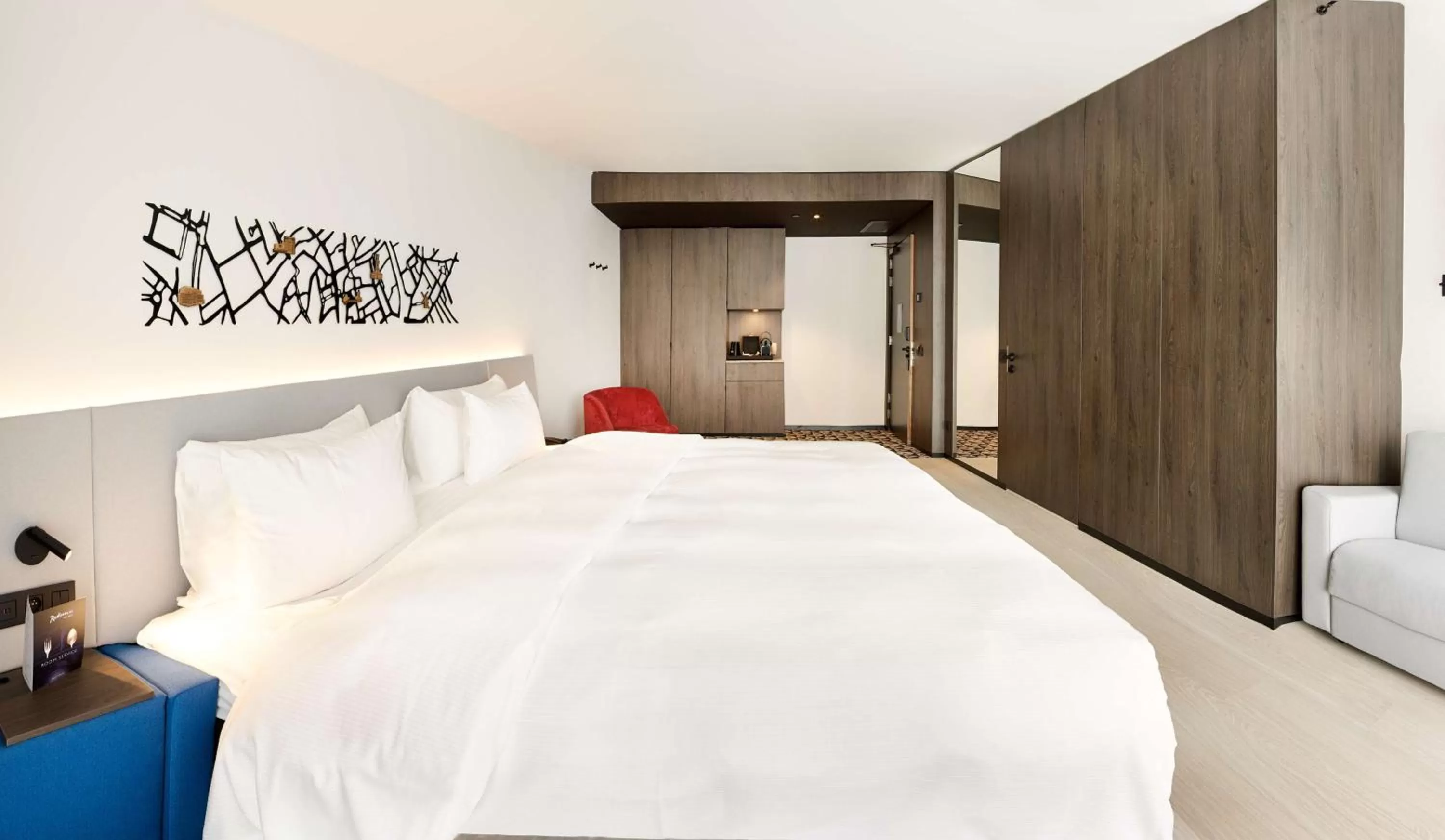 Photo of the whole room, Bed in Radisson Blu Hotel, Bruges