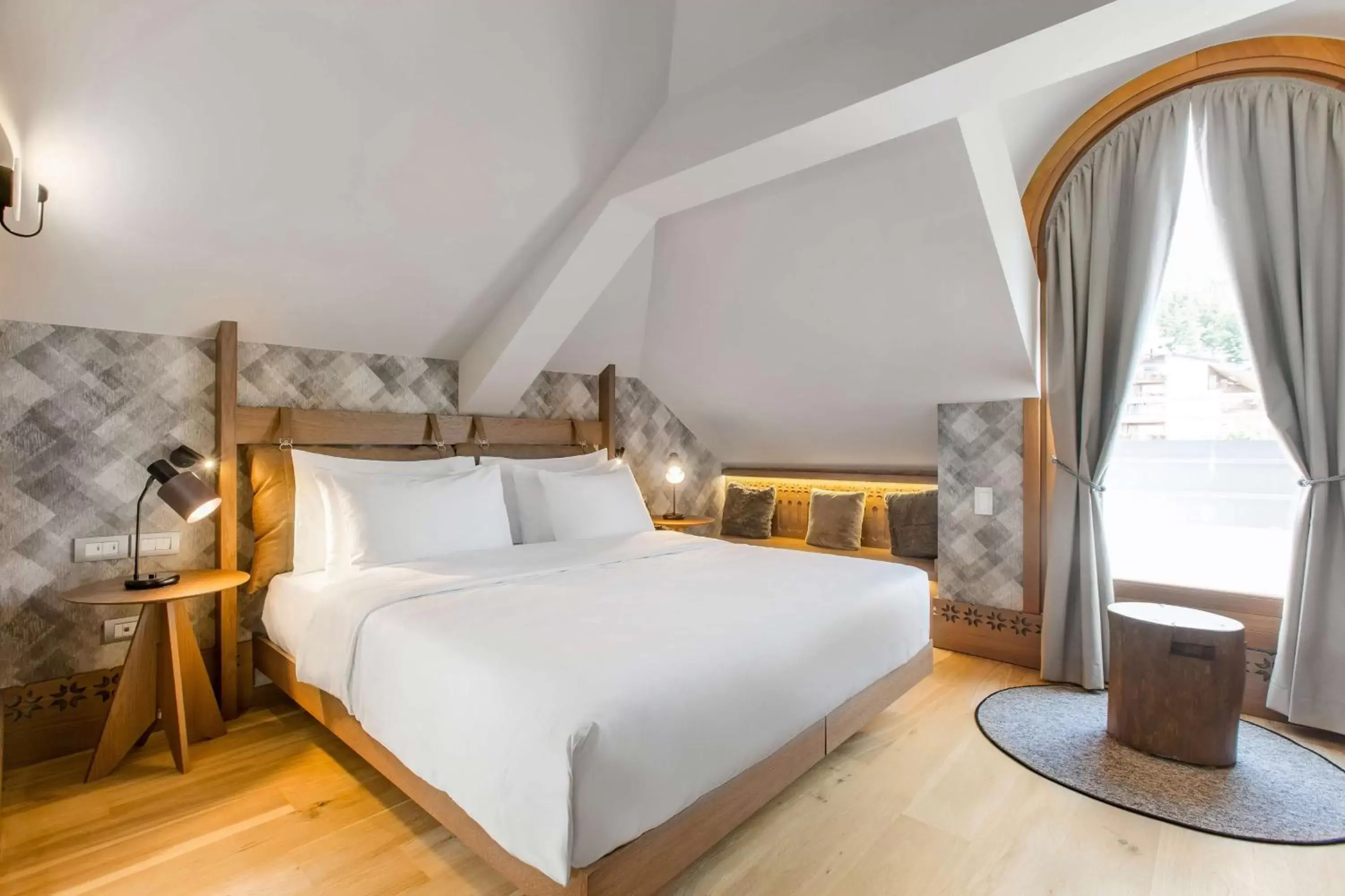 Photo of the whole room, Bed in Grand Hotel Savoia Cortina d'Ampezzo, A Radisson Collection Hotel