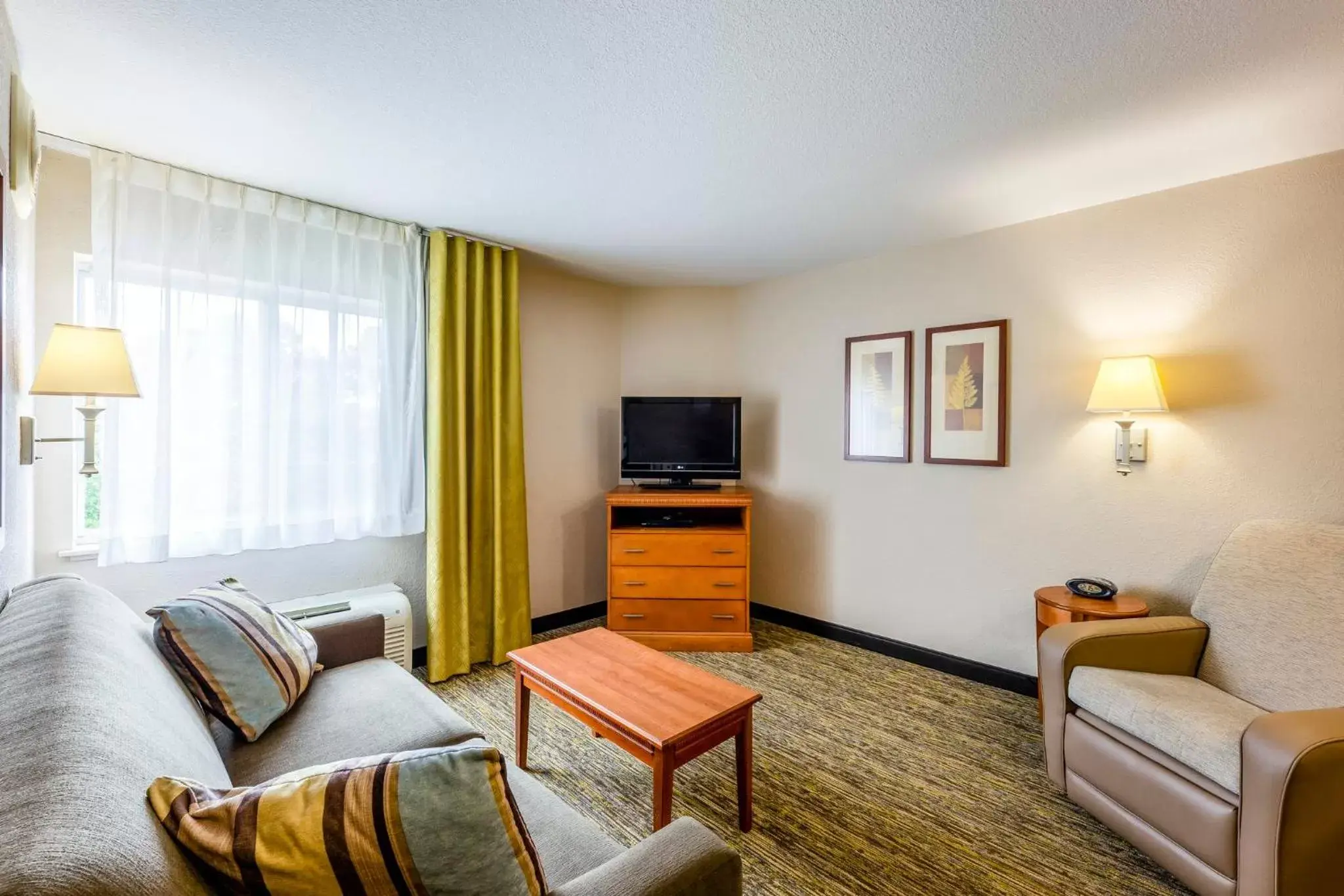 Bedroom, Seating Area in Candlewood Suites Savannah Airport, an IHG Hotel