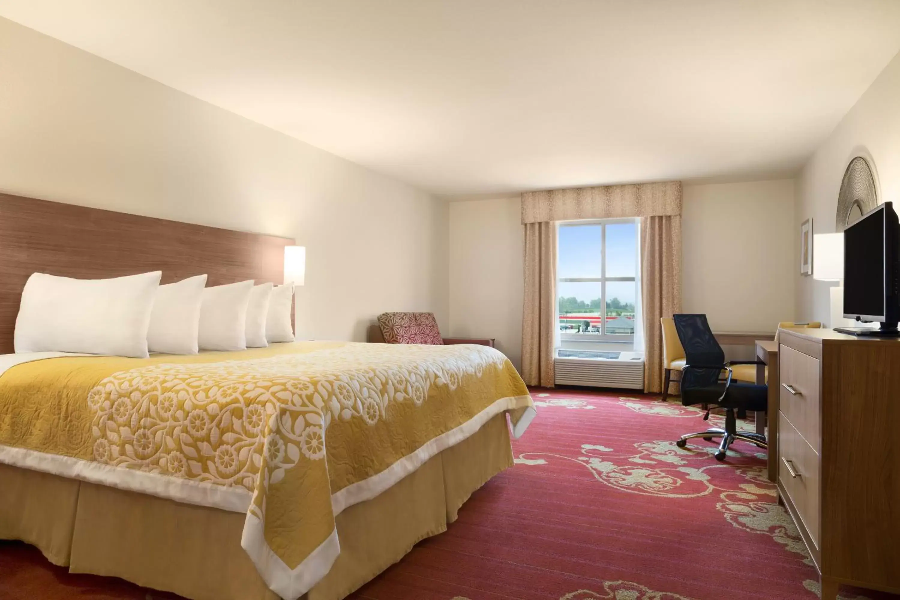 Bed in Days Inn & Suites by Wyndham Belmont