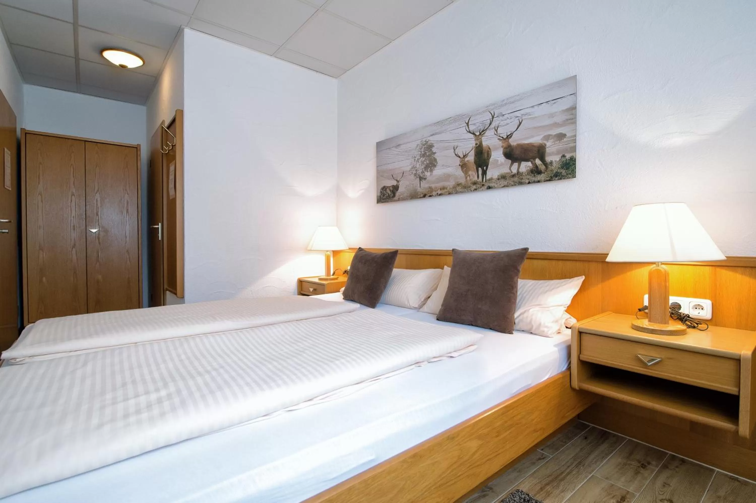 Photo of the whole room, Bed in Hotel-Restaurant Schwyzerhüsli