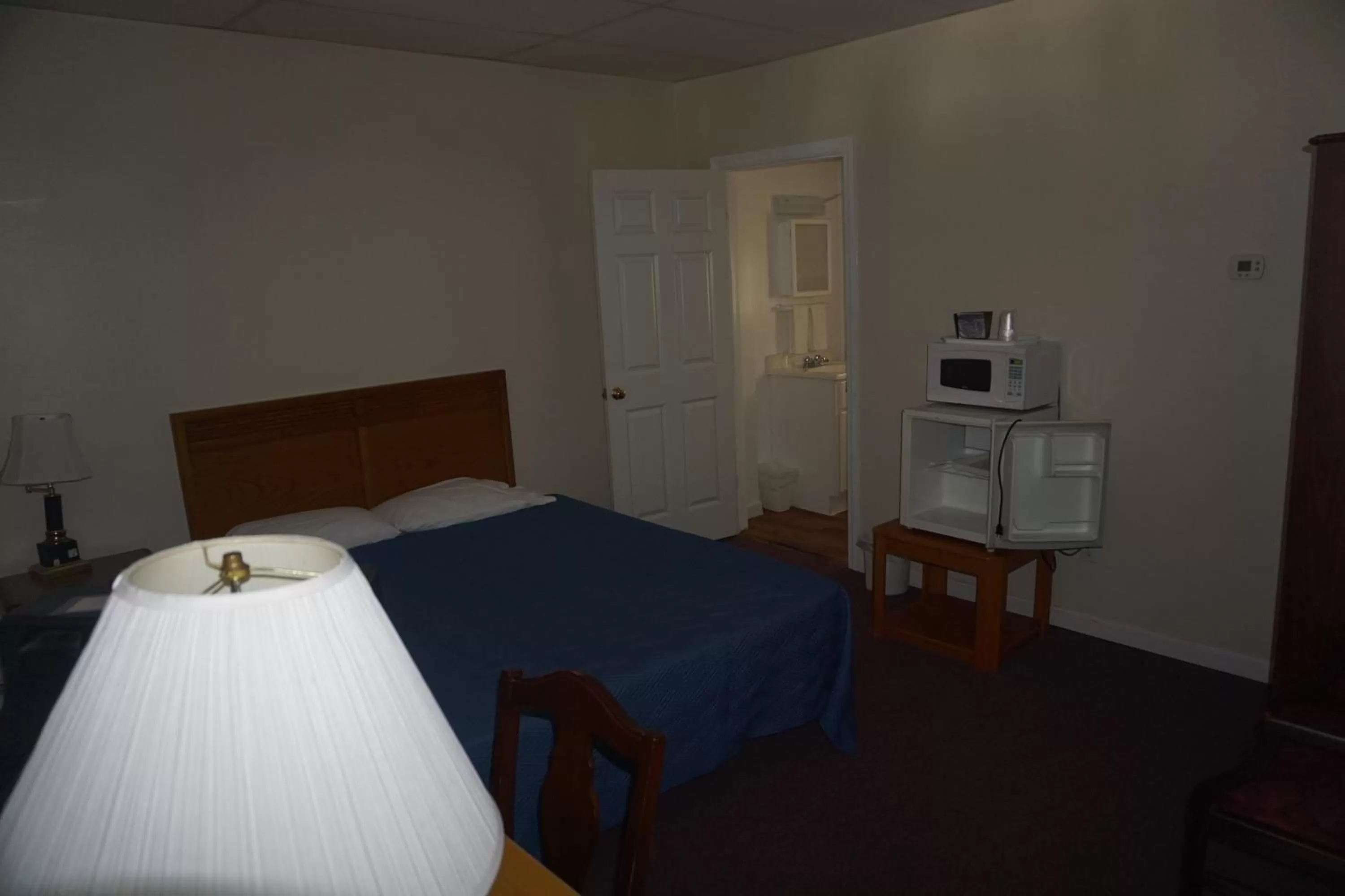 Bed in Northern Peaks Motor Inn