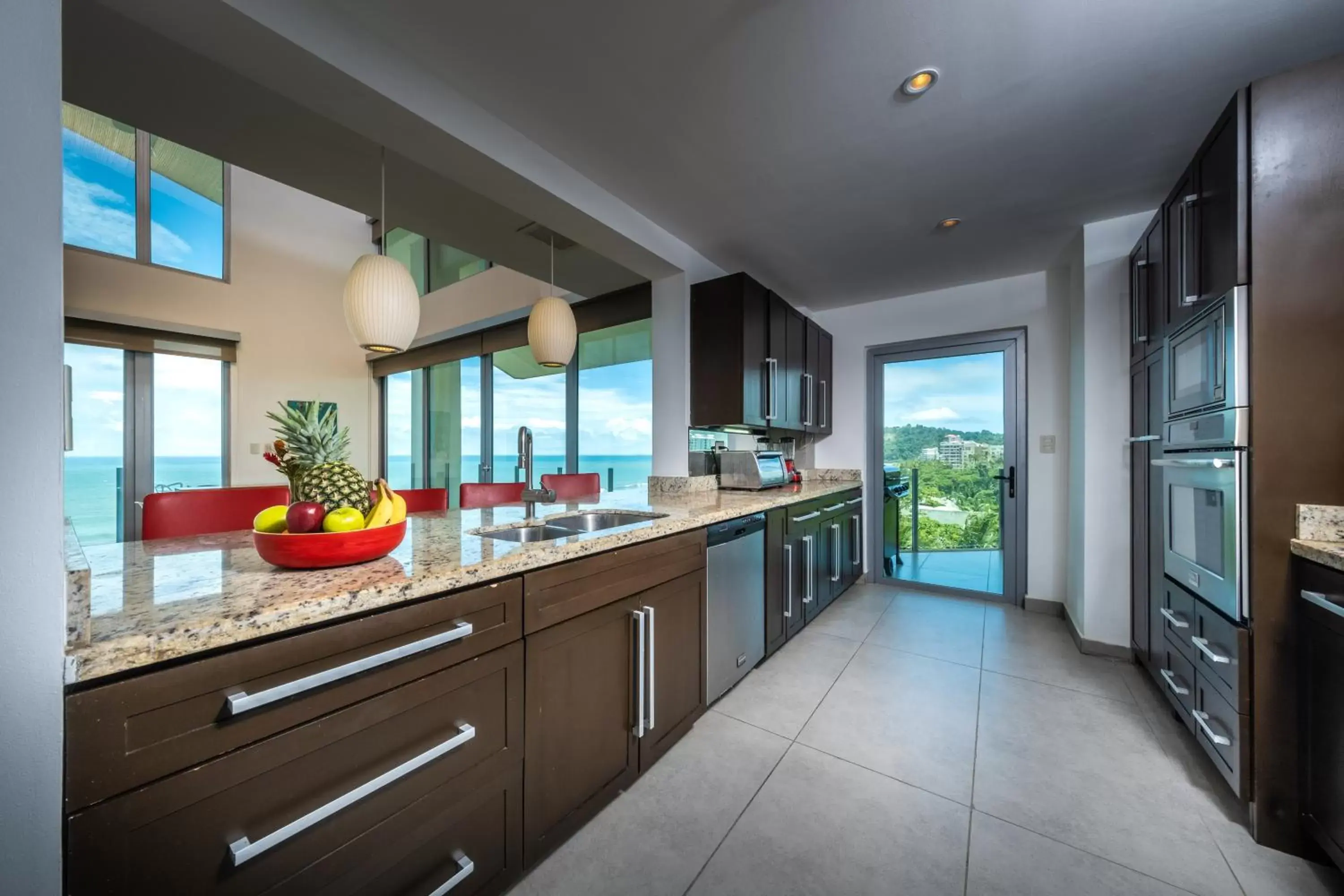 Kitchen/Kitchenette in Best in Jaco Condos at Diamante del Sol