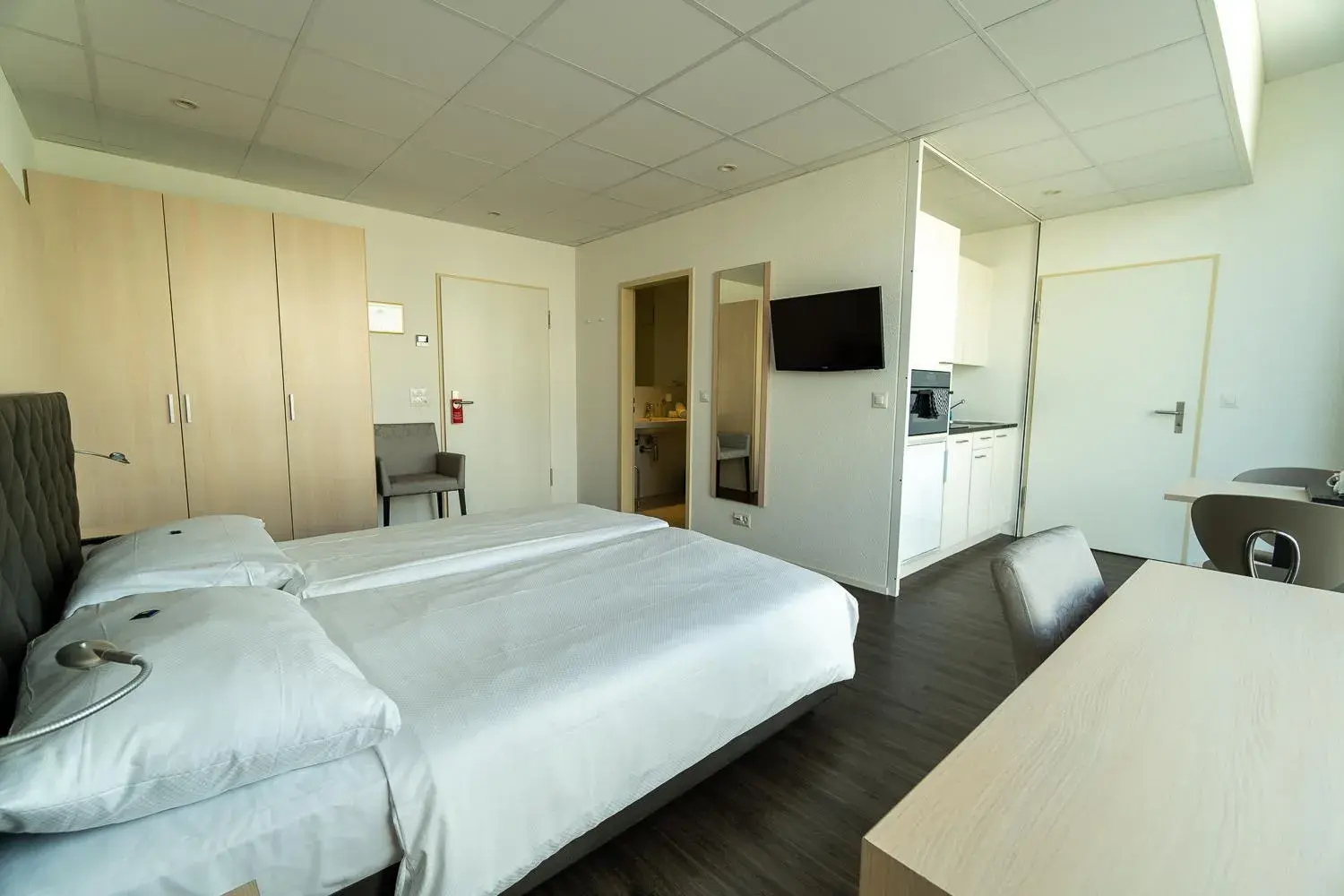 Photo of the whole room, Bed in Hotel Hine Adon Bern Airport