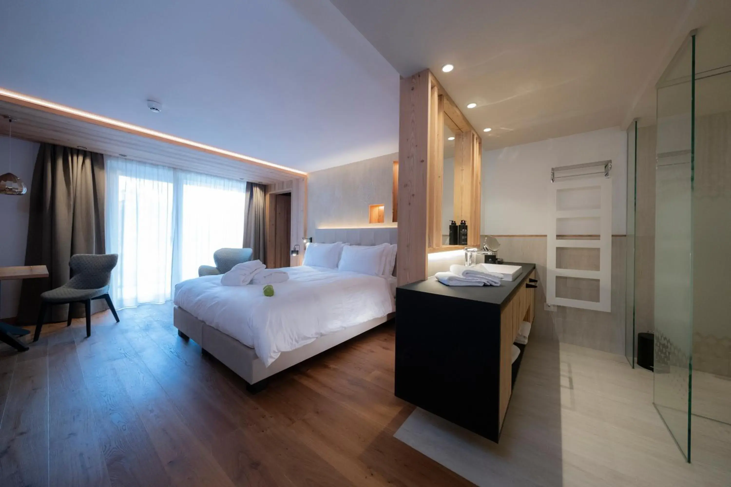 Bed in Ciampedie Luxury Alpine Spa Hotel