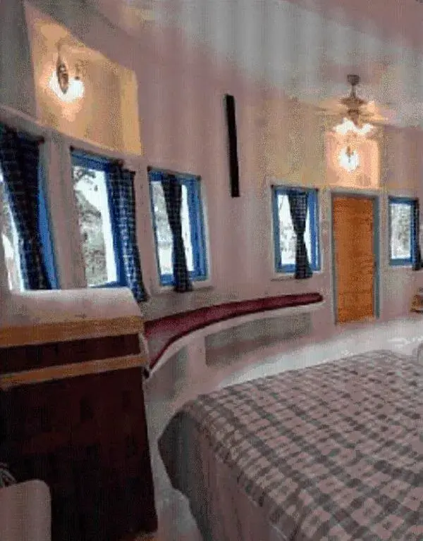 Bed in Scenic Riverside Resort