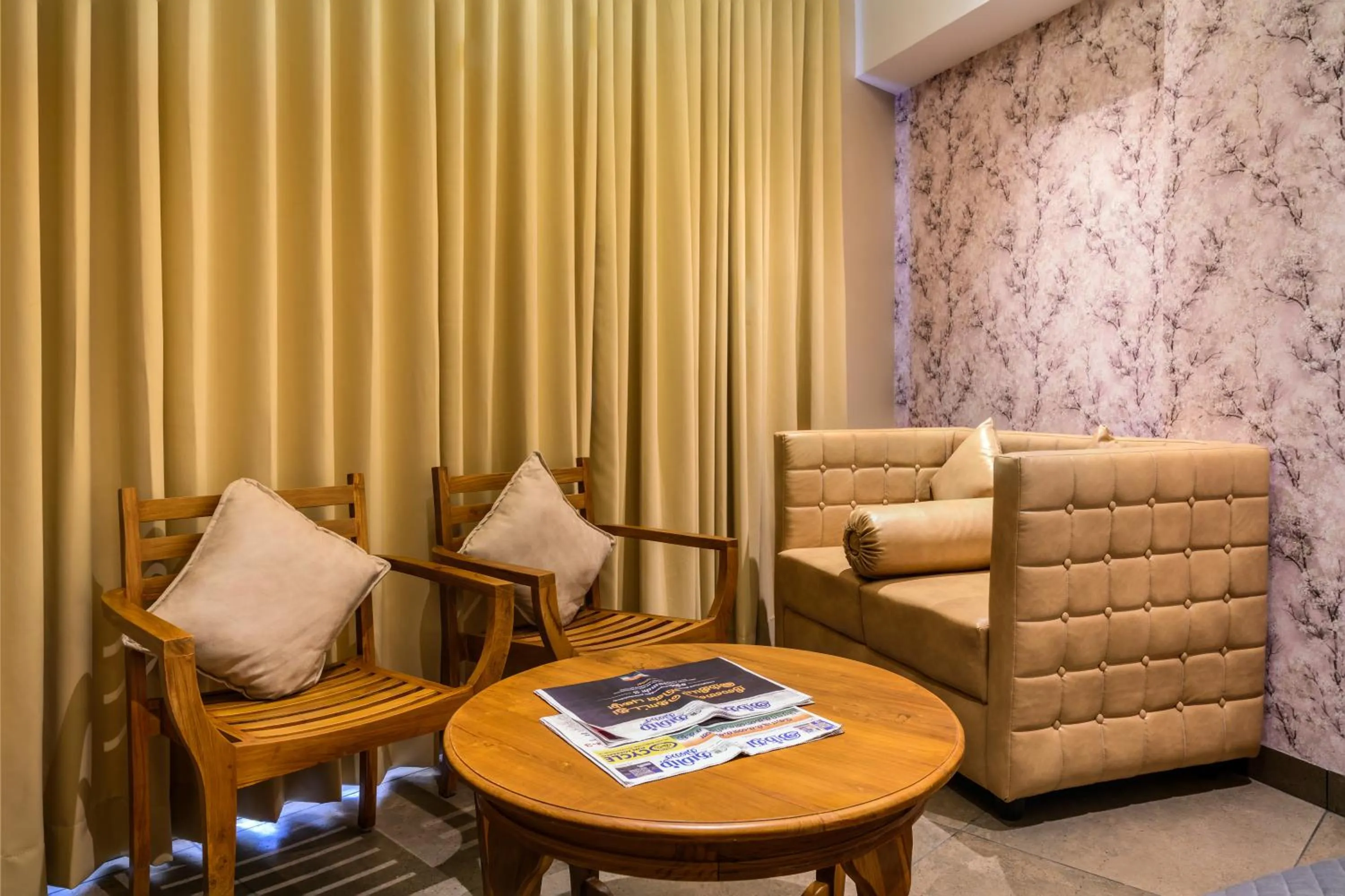 Seating area in Sundex Hotel