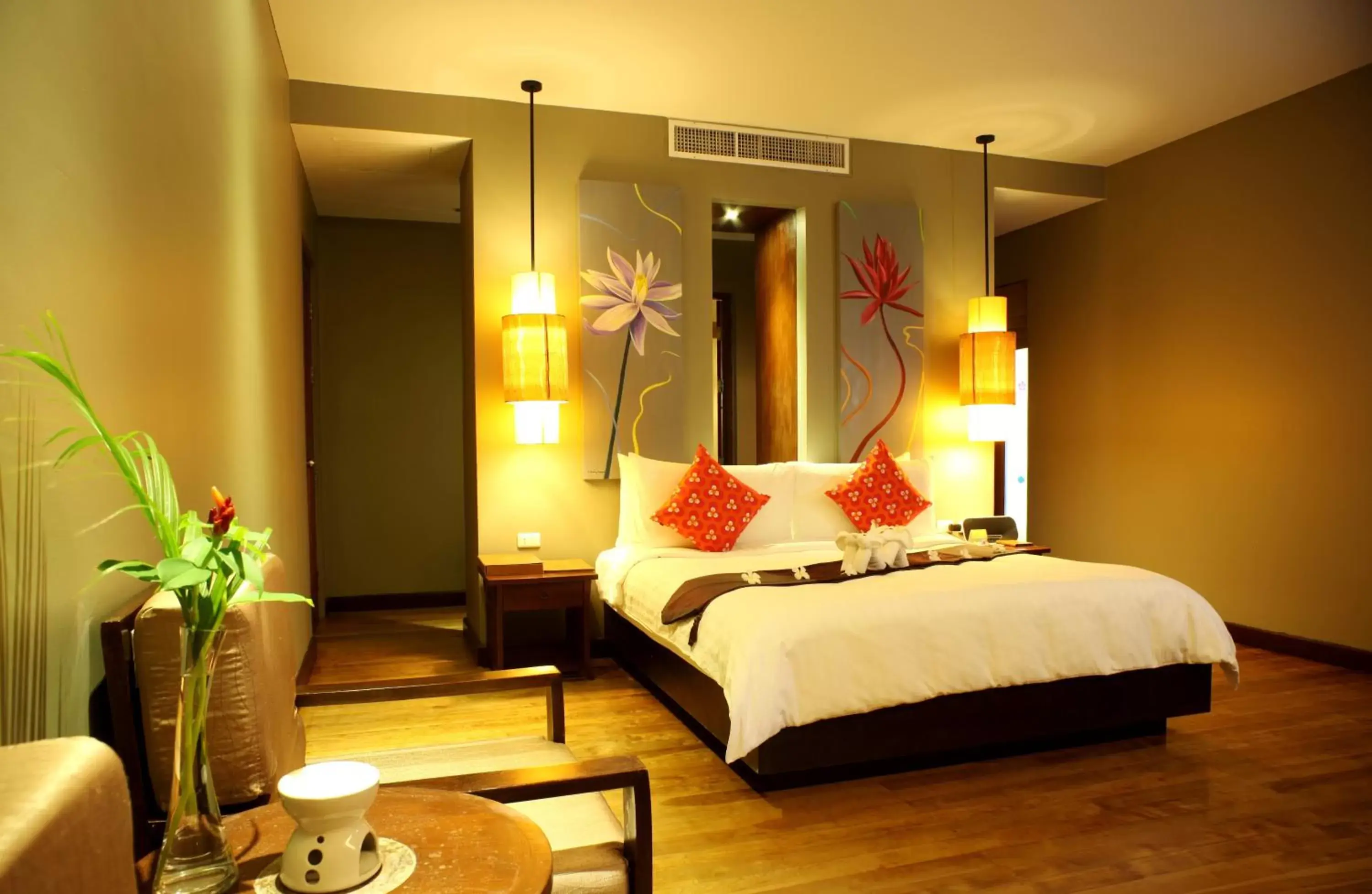 Bed in Chongfah Beach Resort Khaolak - SHA Extra Plus