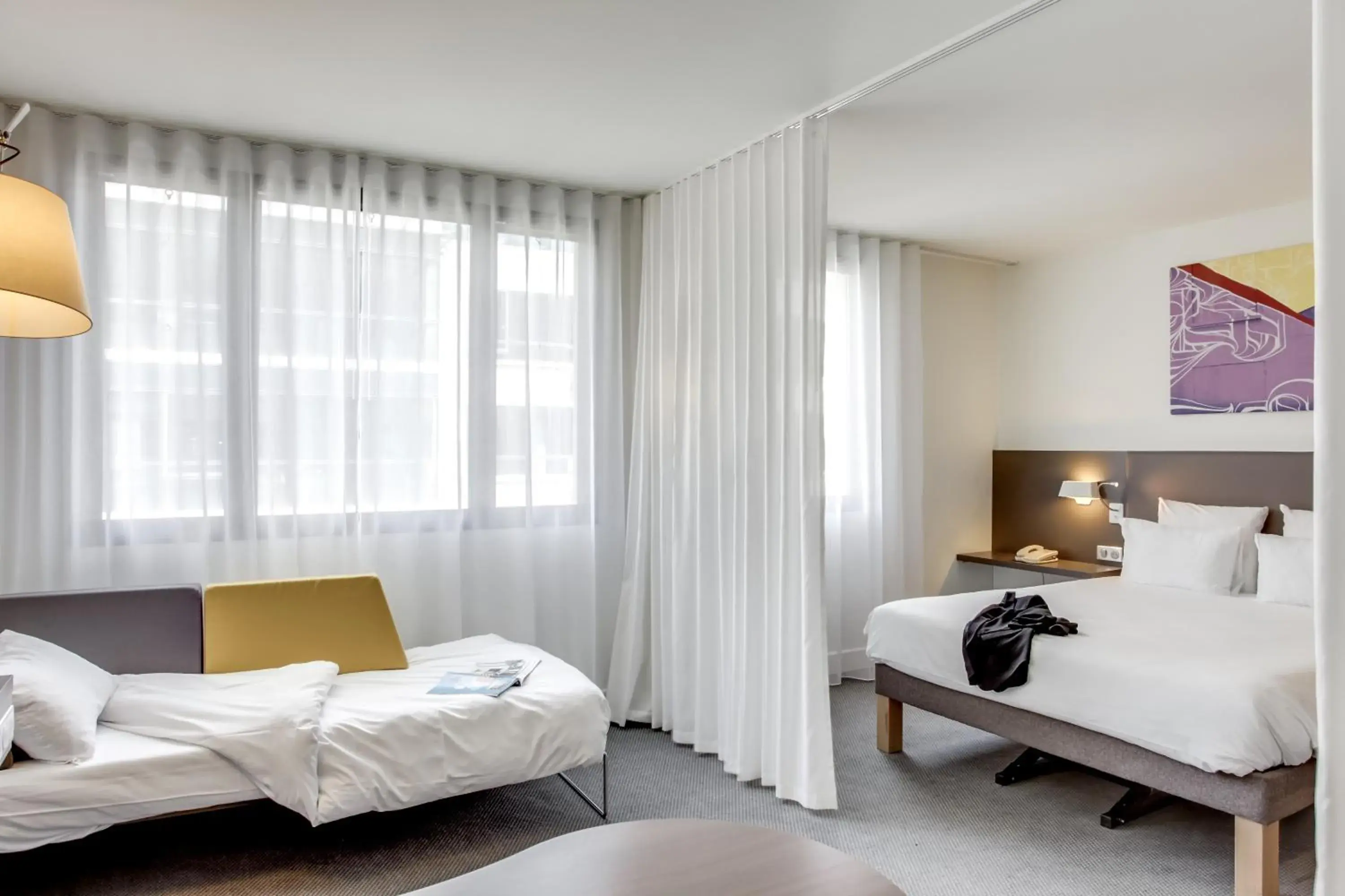 Superior Suite with Double Bed, Single Bed and Sofa Bed in Novotel Suites Paris Stade de France