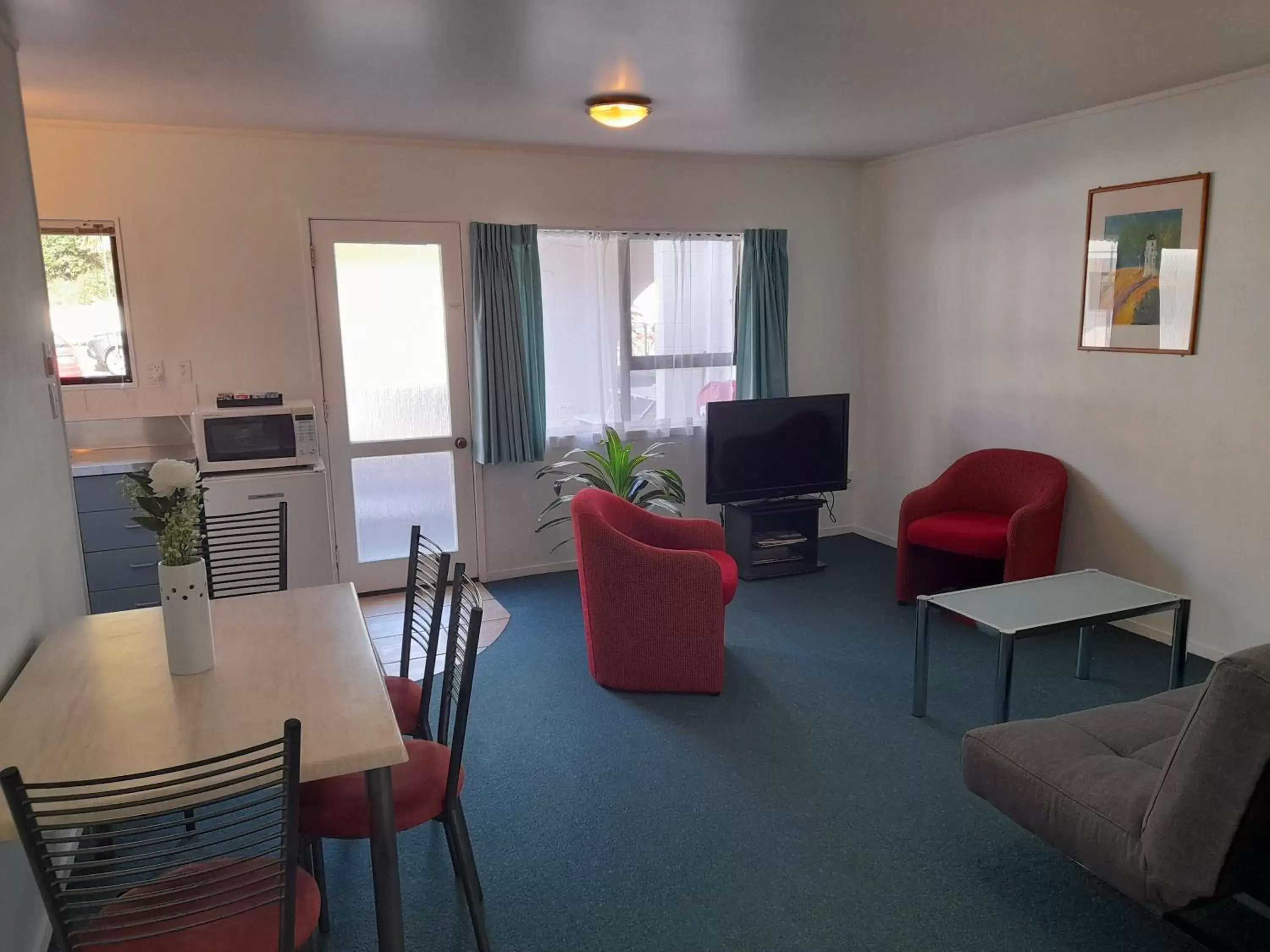 Living room, Seating Area in Marlin Court Motel