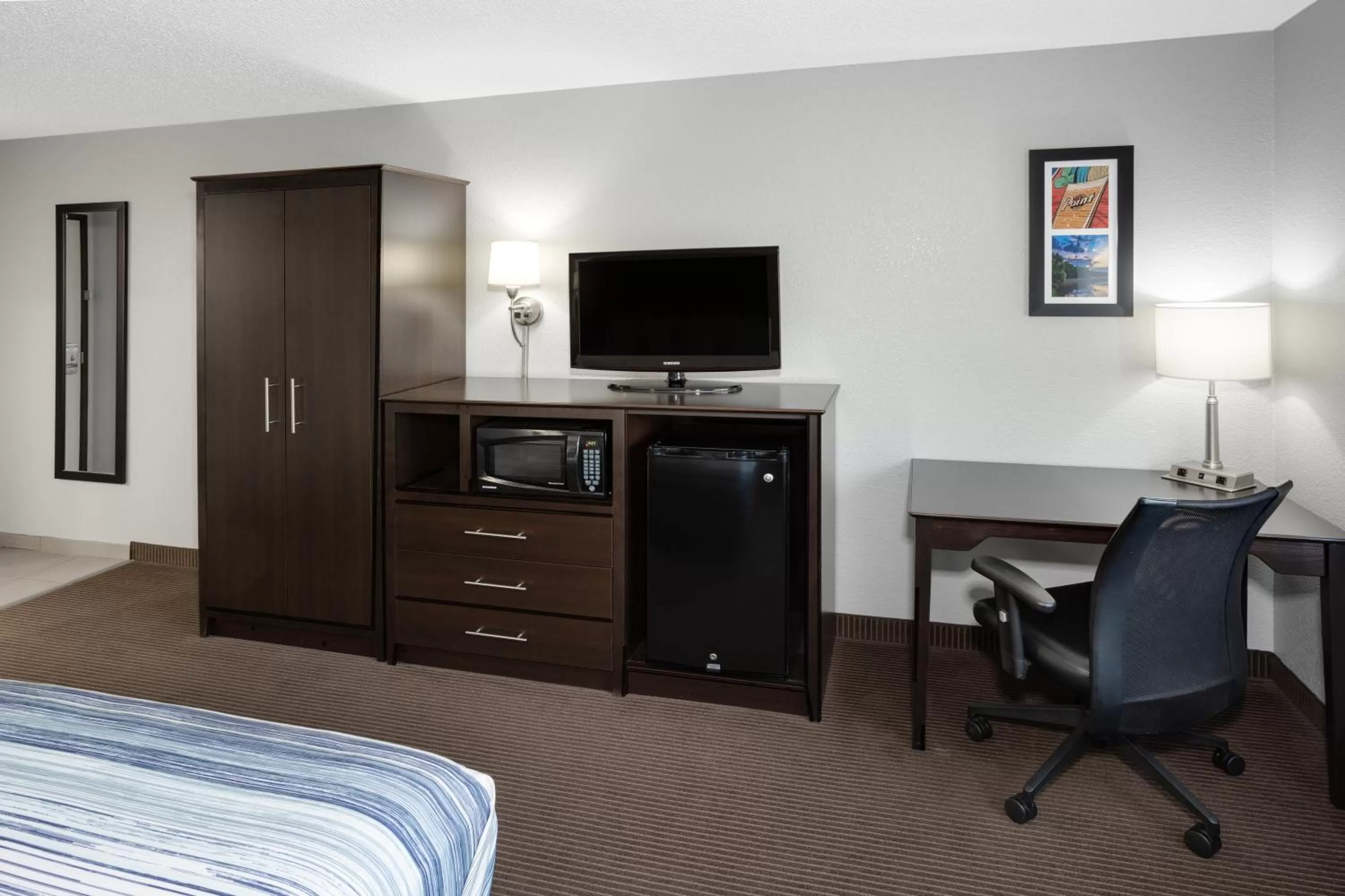 Guests, Bed in AmericInn by Wyndham Plover Stevens Point