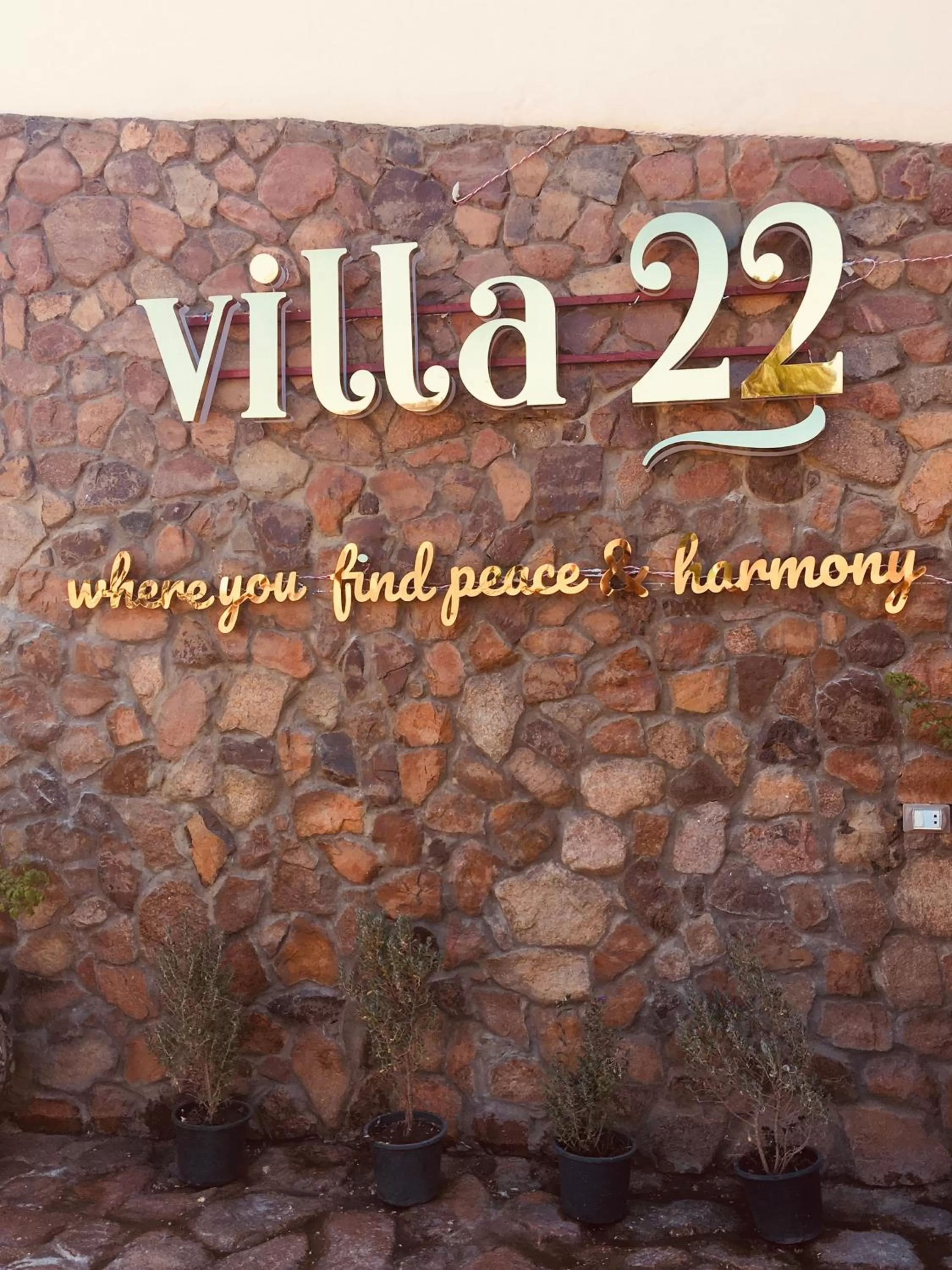 Property logo or sign in Villa 22