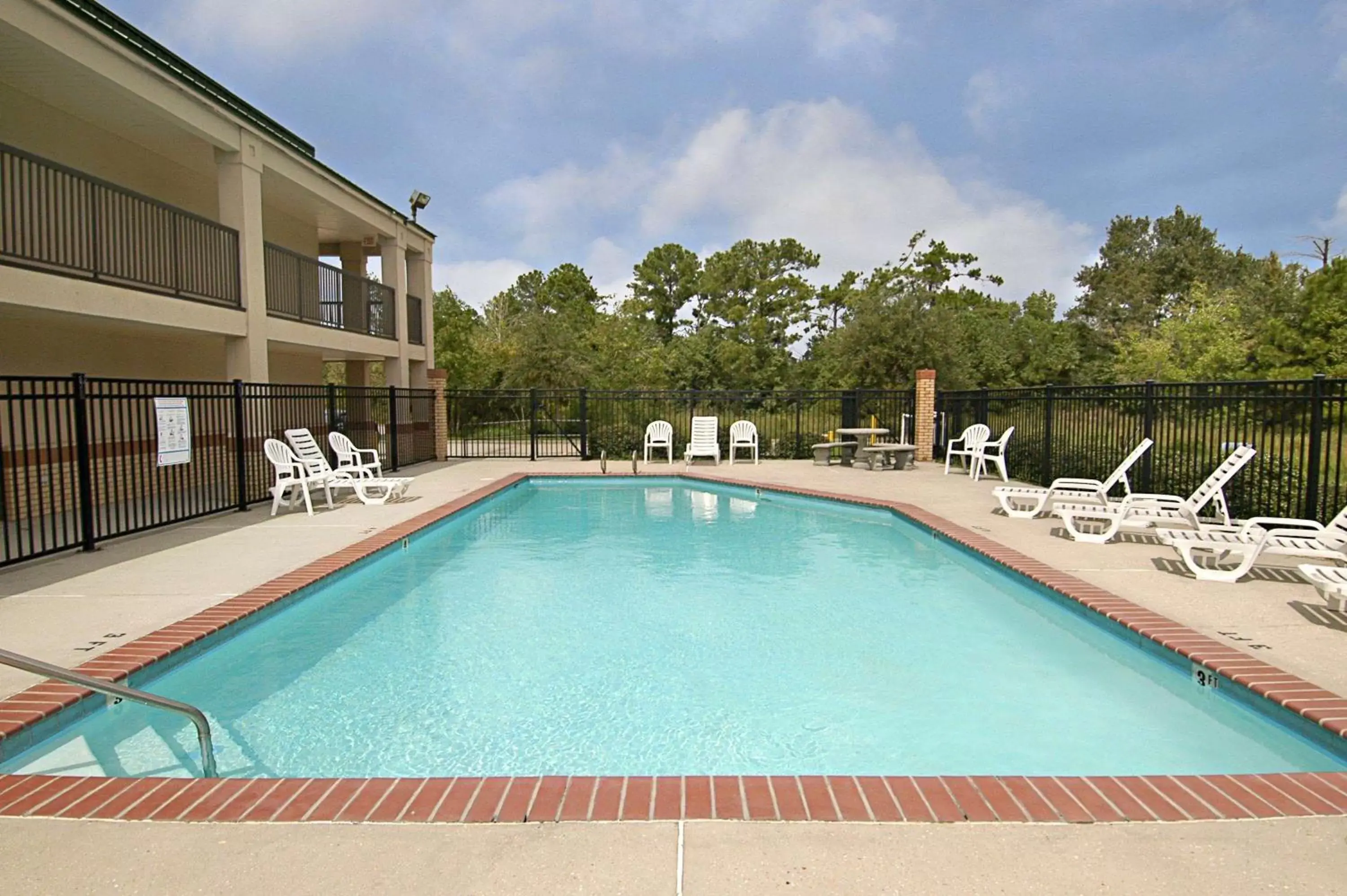 Pool view, Swimming Pool in Super 8 by Wyndham Slidell