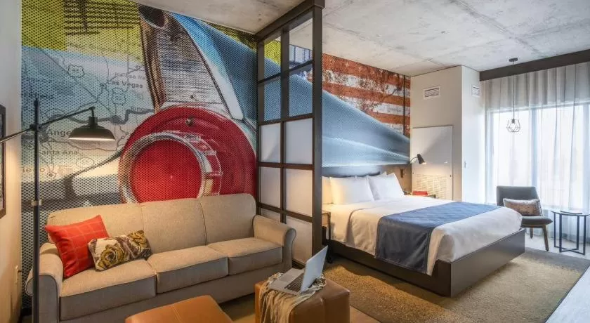 Bed in Hotel Indigo Tulsa DWTN/Entertainment Area