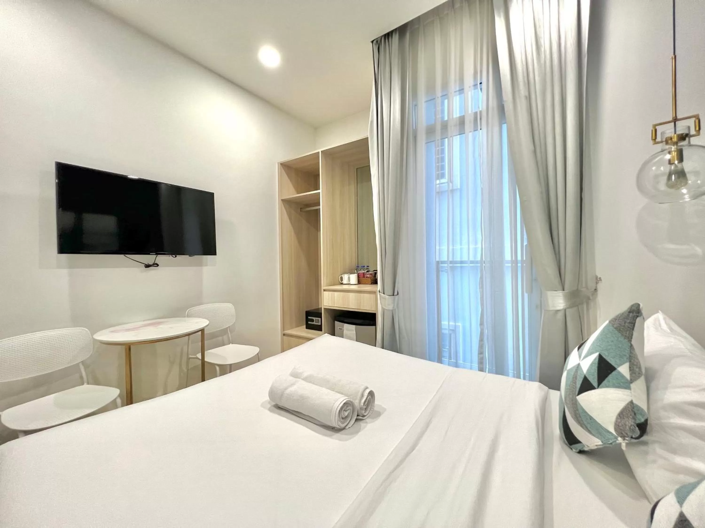 Bed in Helen Fin Inn & Apartment