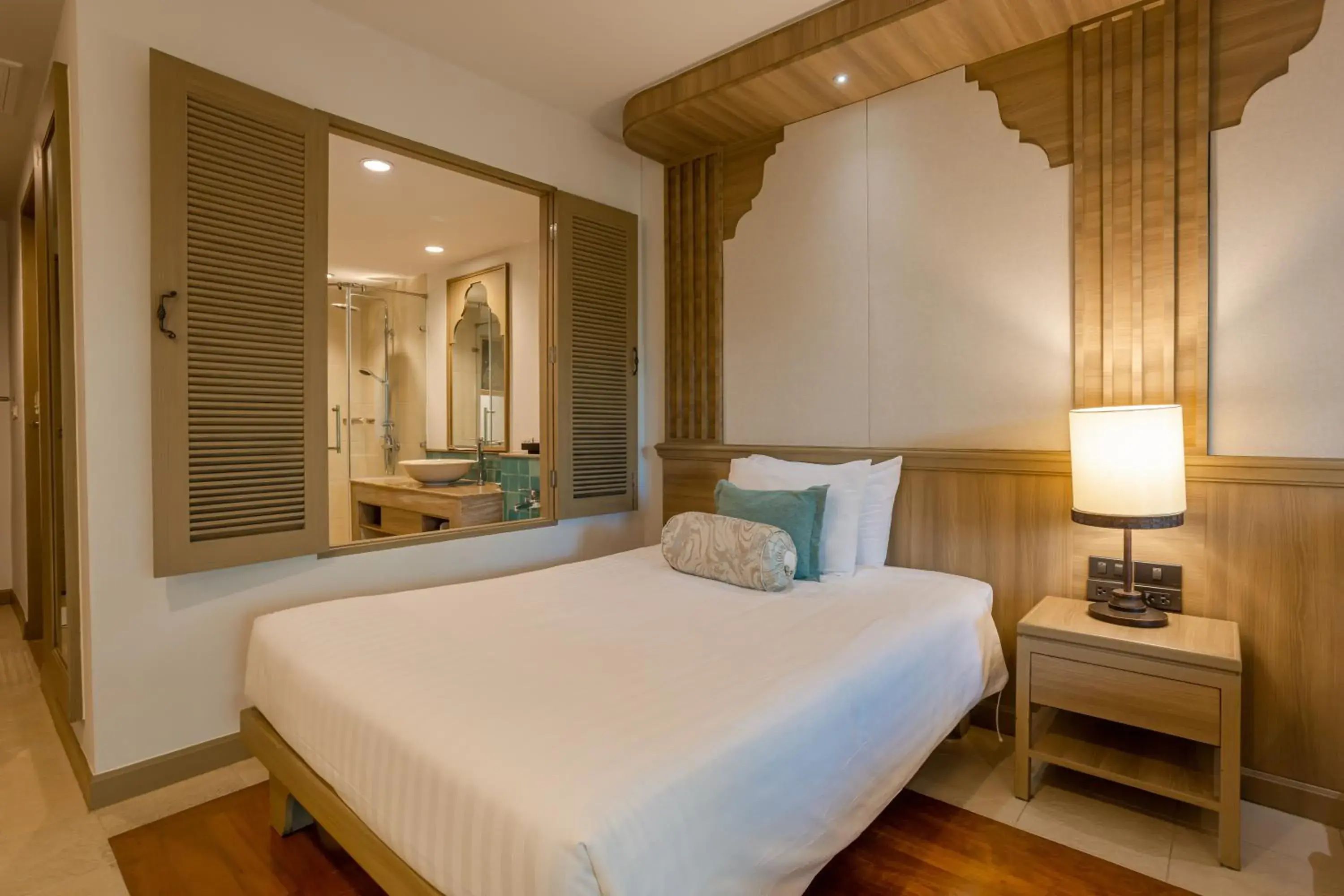 Bed in Ravindra Beach Resort & Spa - SHA Extra Plus