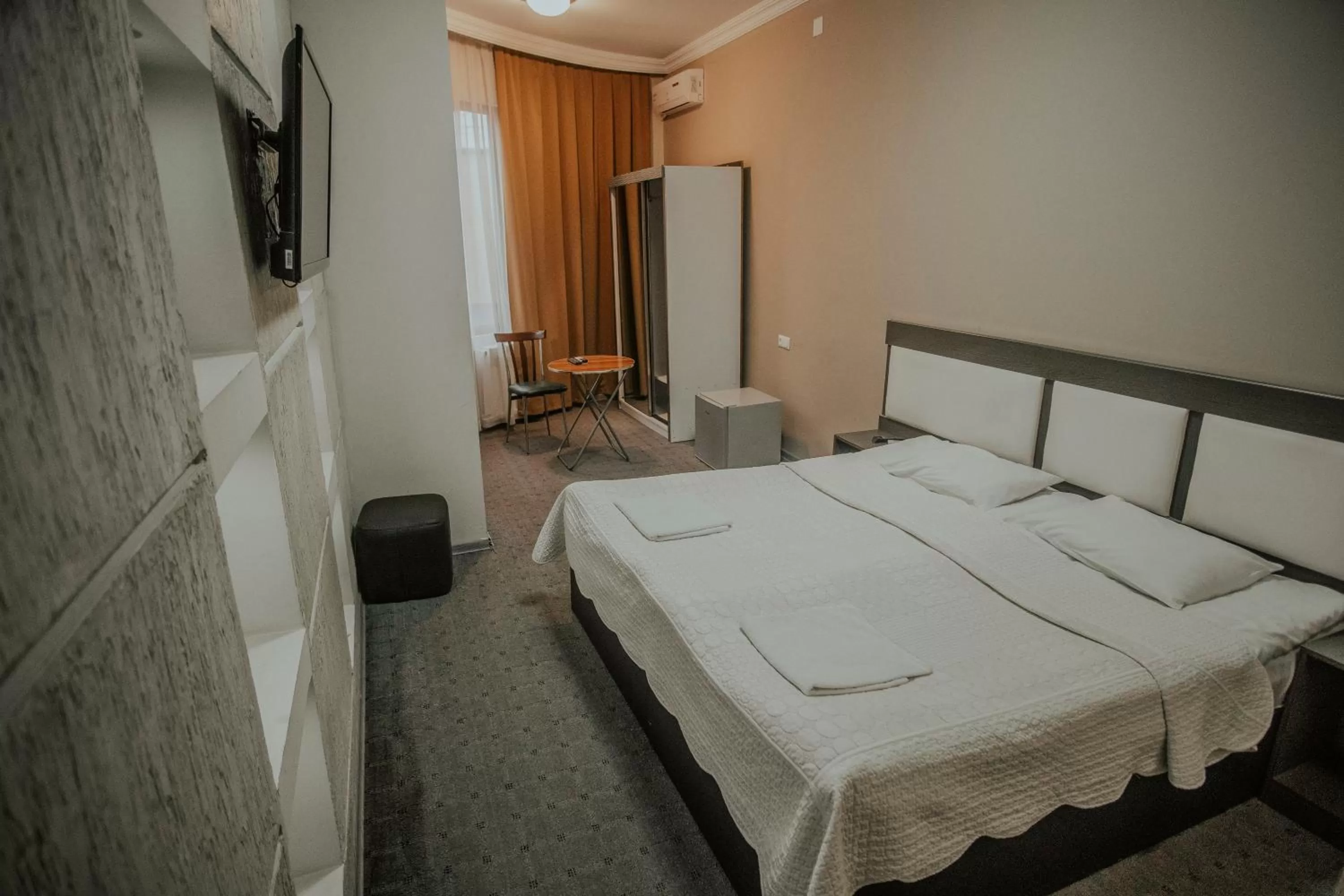 Bed in Discovery Hotel