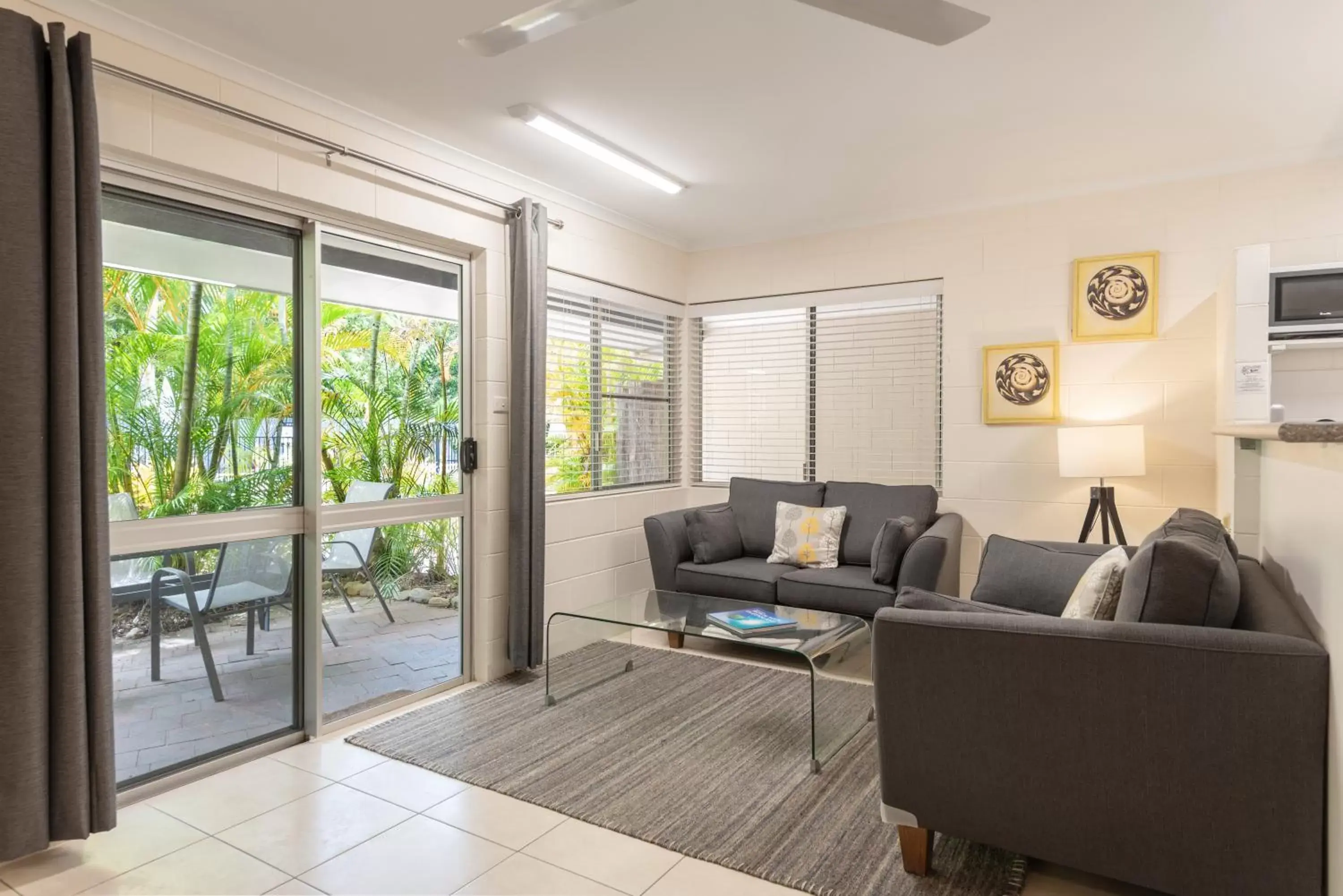 Living room, Seating Area in Lychee Tree Holiday Apartments