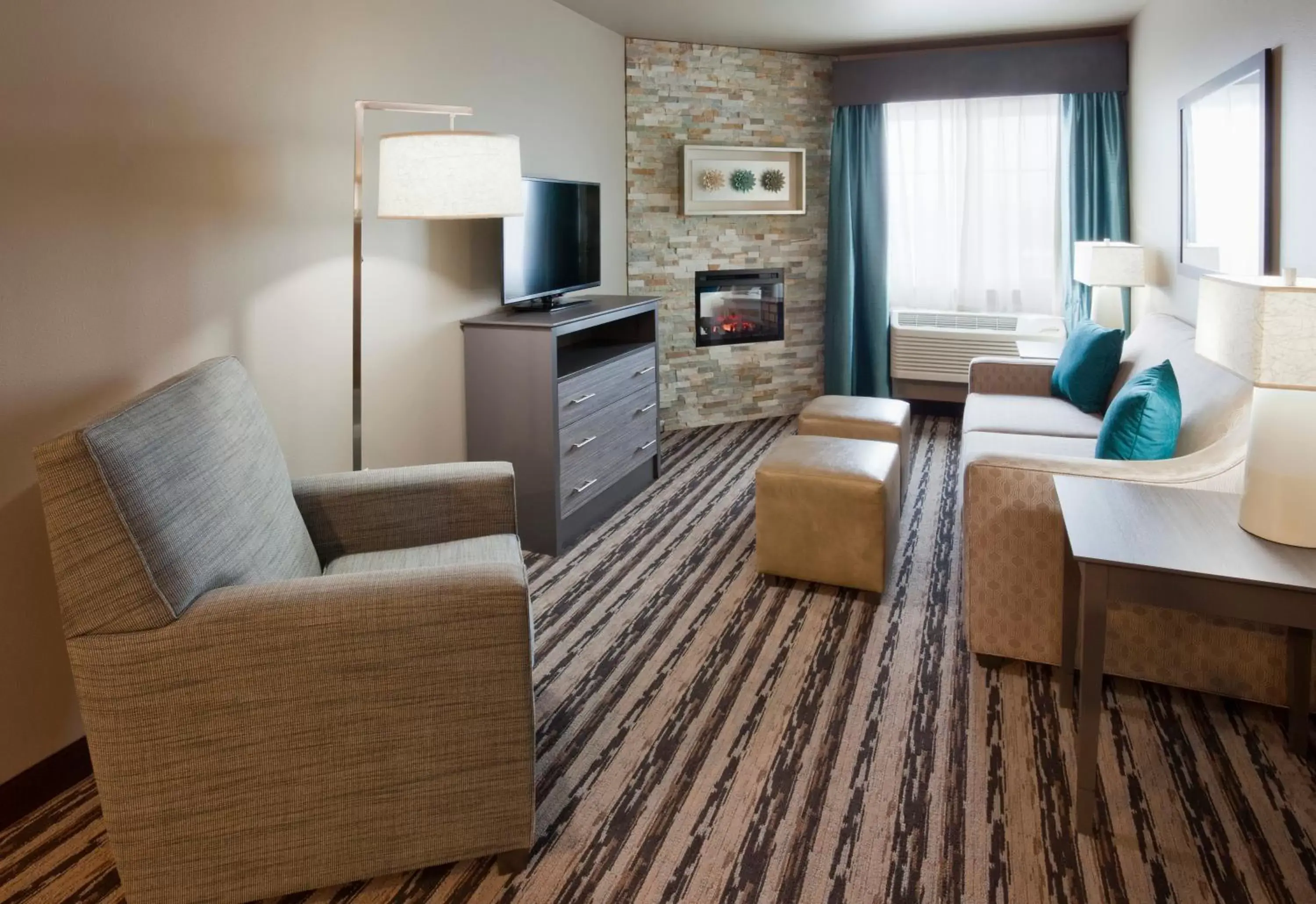 Living room, Seating Area in GrandStay Hotel & Suites Valley City
