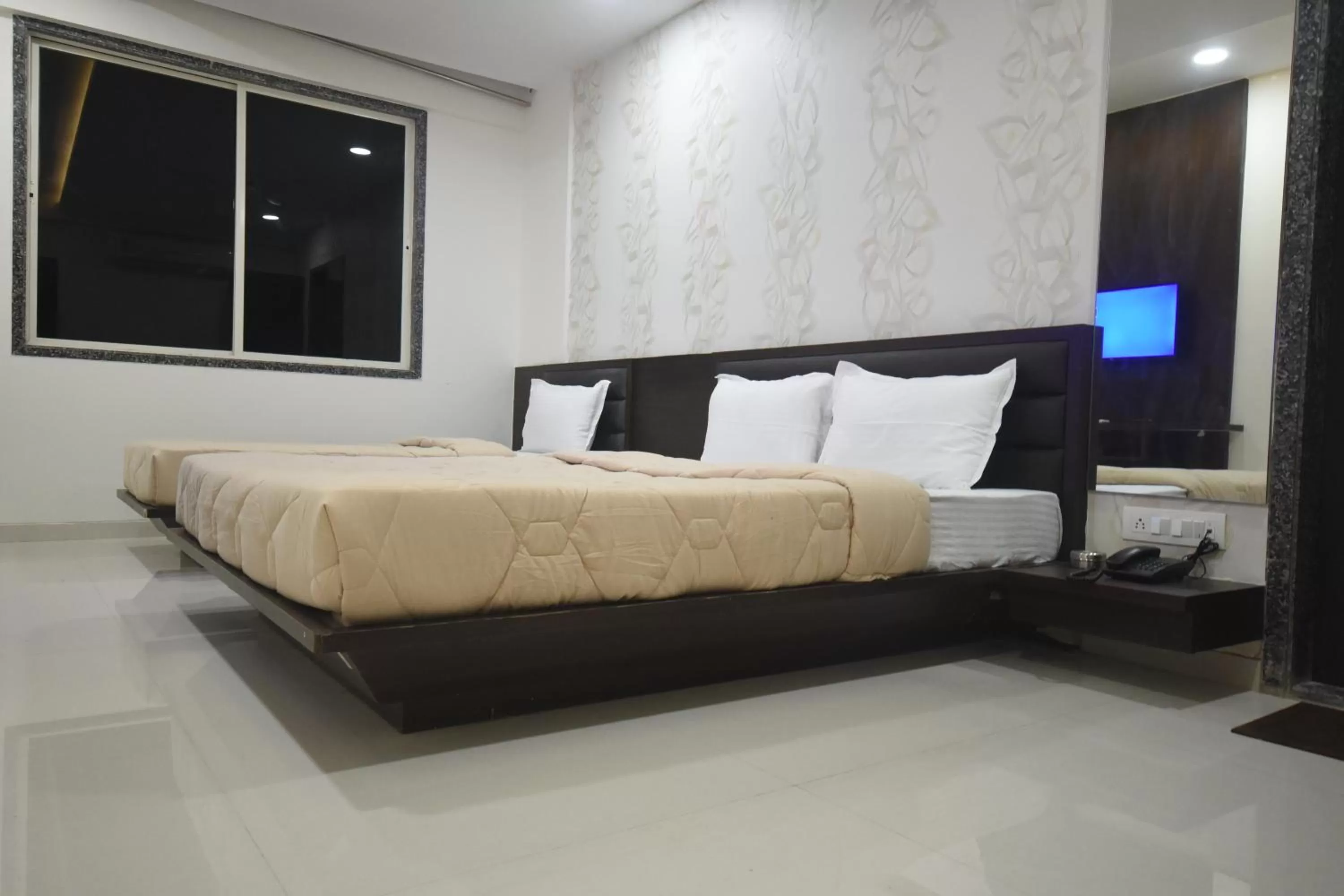 Bed in The Pacific Hotel