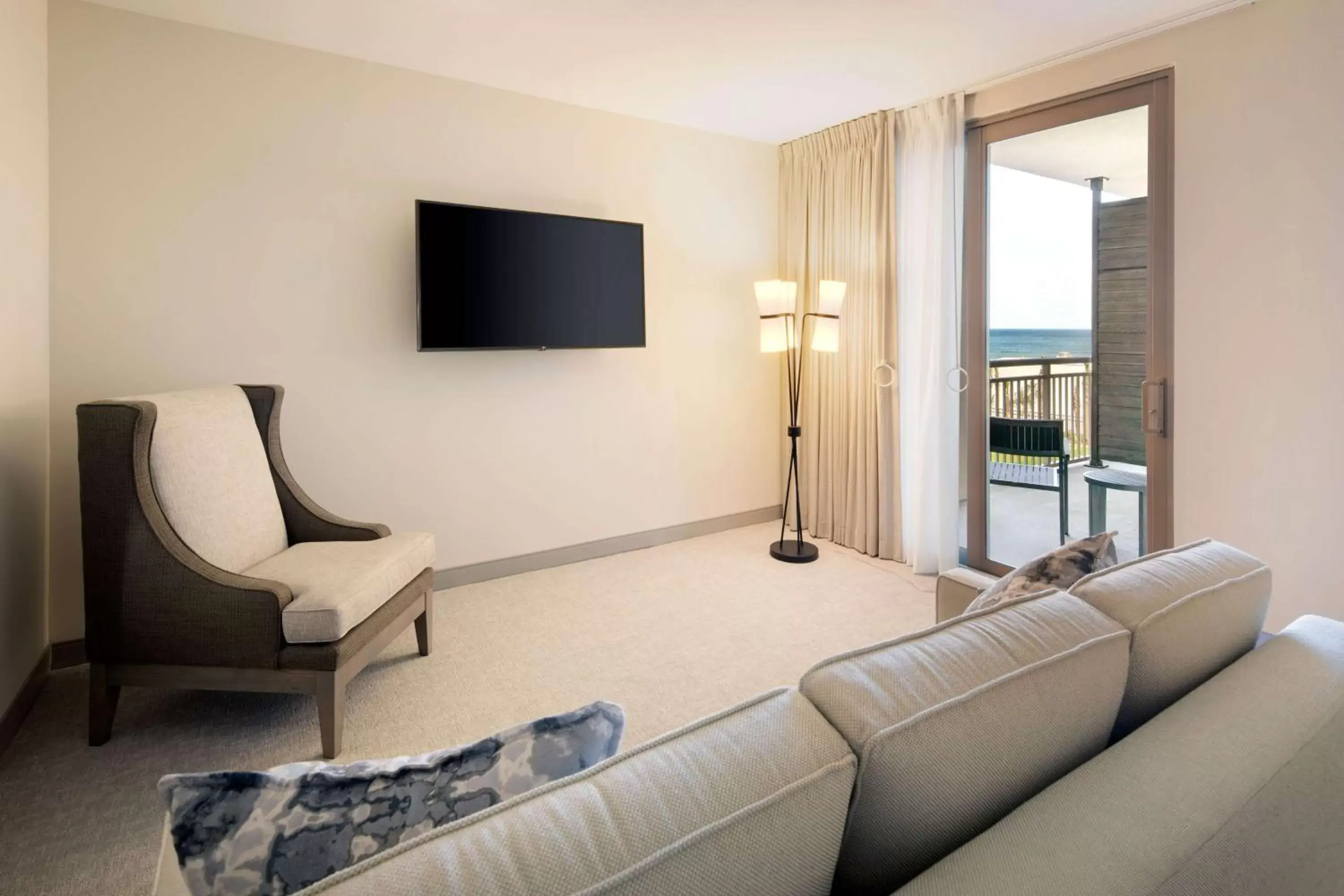 Bedroom, Seating Area in Embassy Suites St Augustine Beach Oceanfront Resort