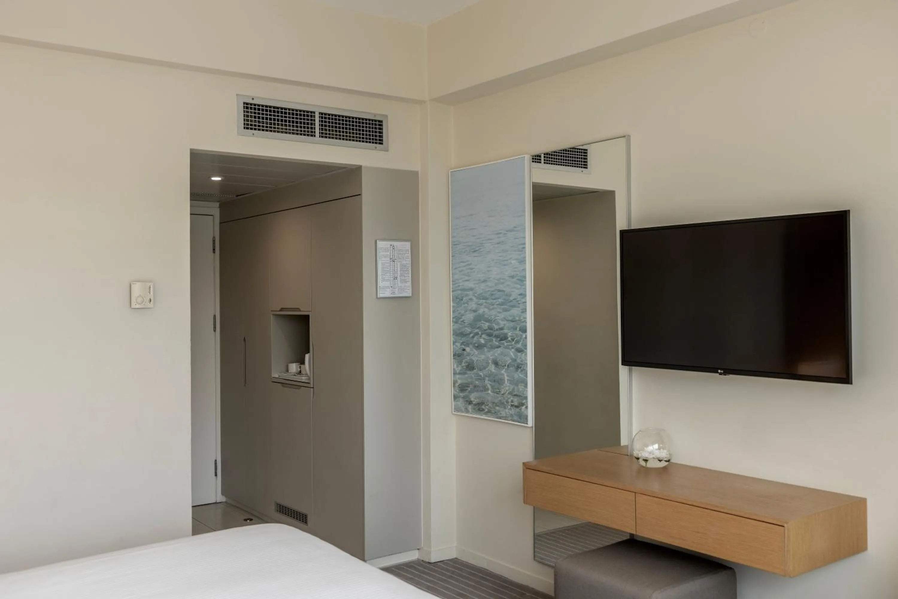 Bed in Capo Bay Hotel