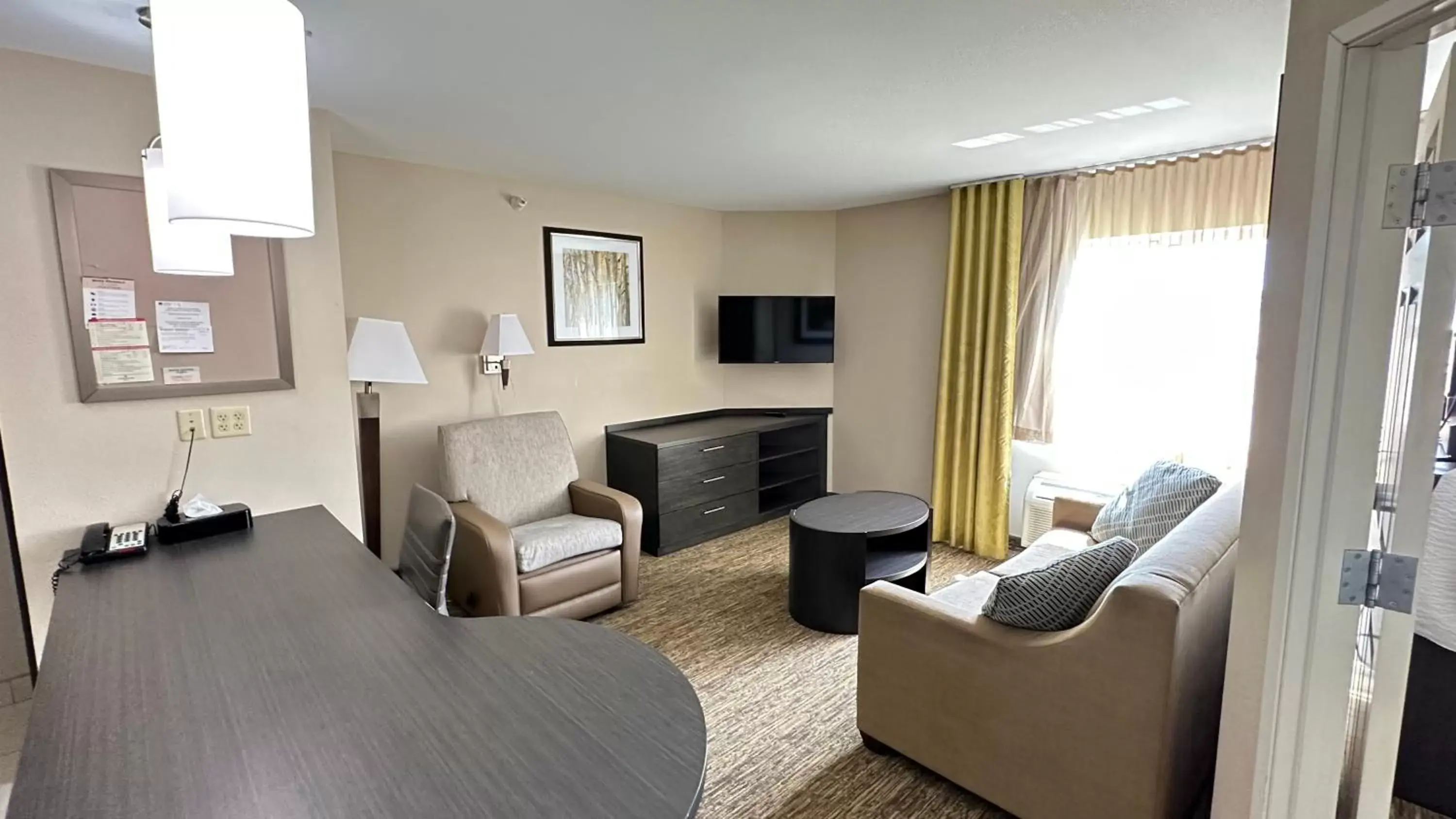 Living room, Seating Area in Candlewood Suites South Bend Airport, an IHG Hotel