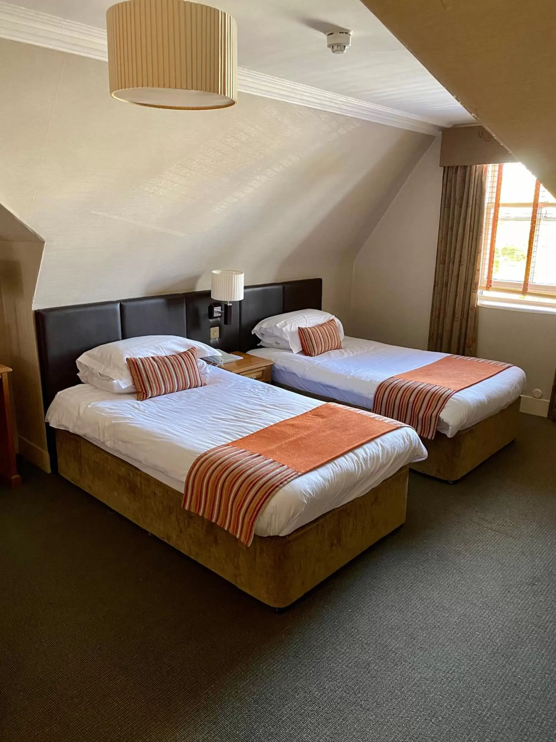 Bed in The Dutch Mill Hotel
