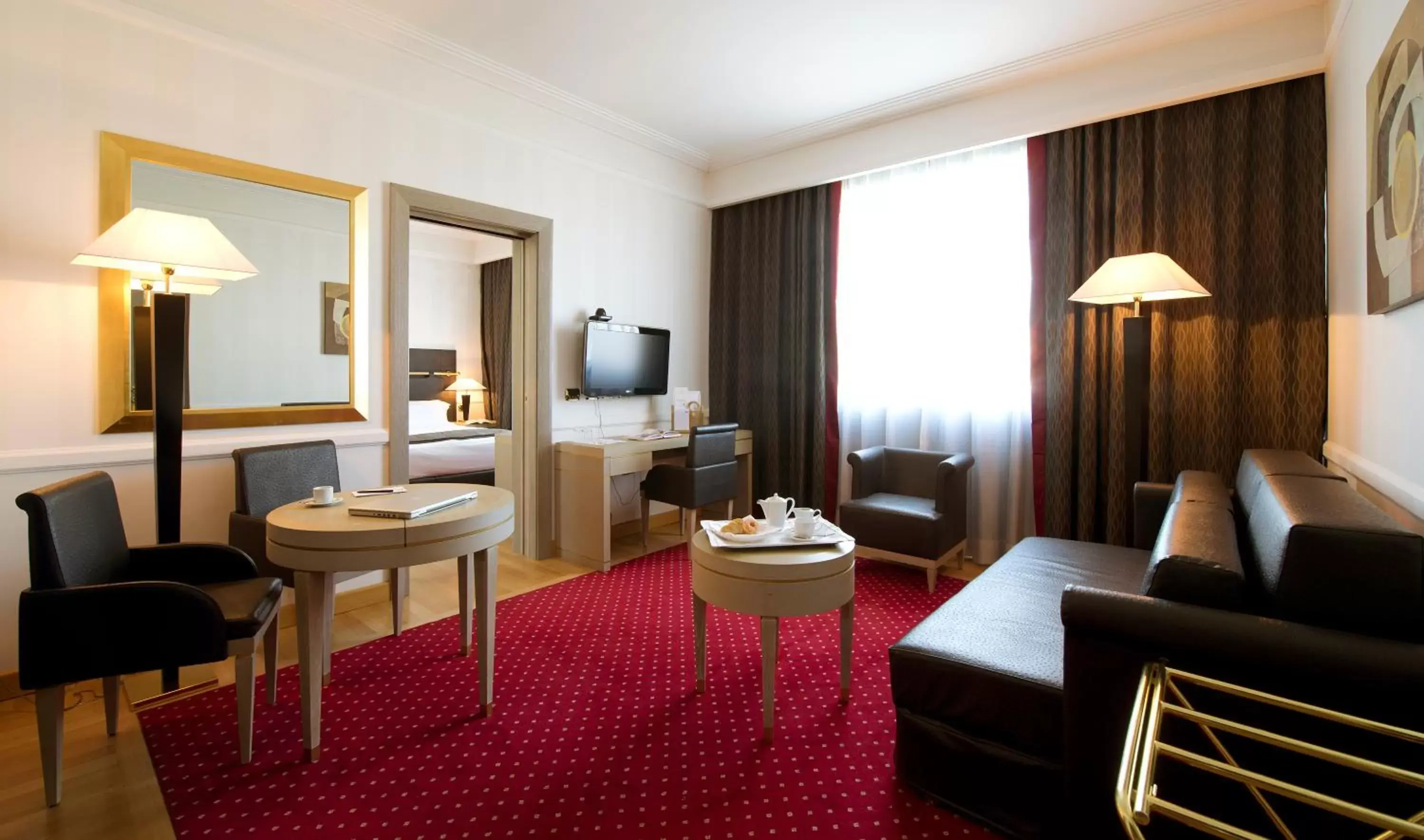 Living room in Grand Hotel Duca Di Mantova Living room in Grand Hotel Duca Di Mantova