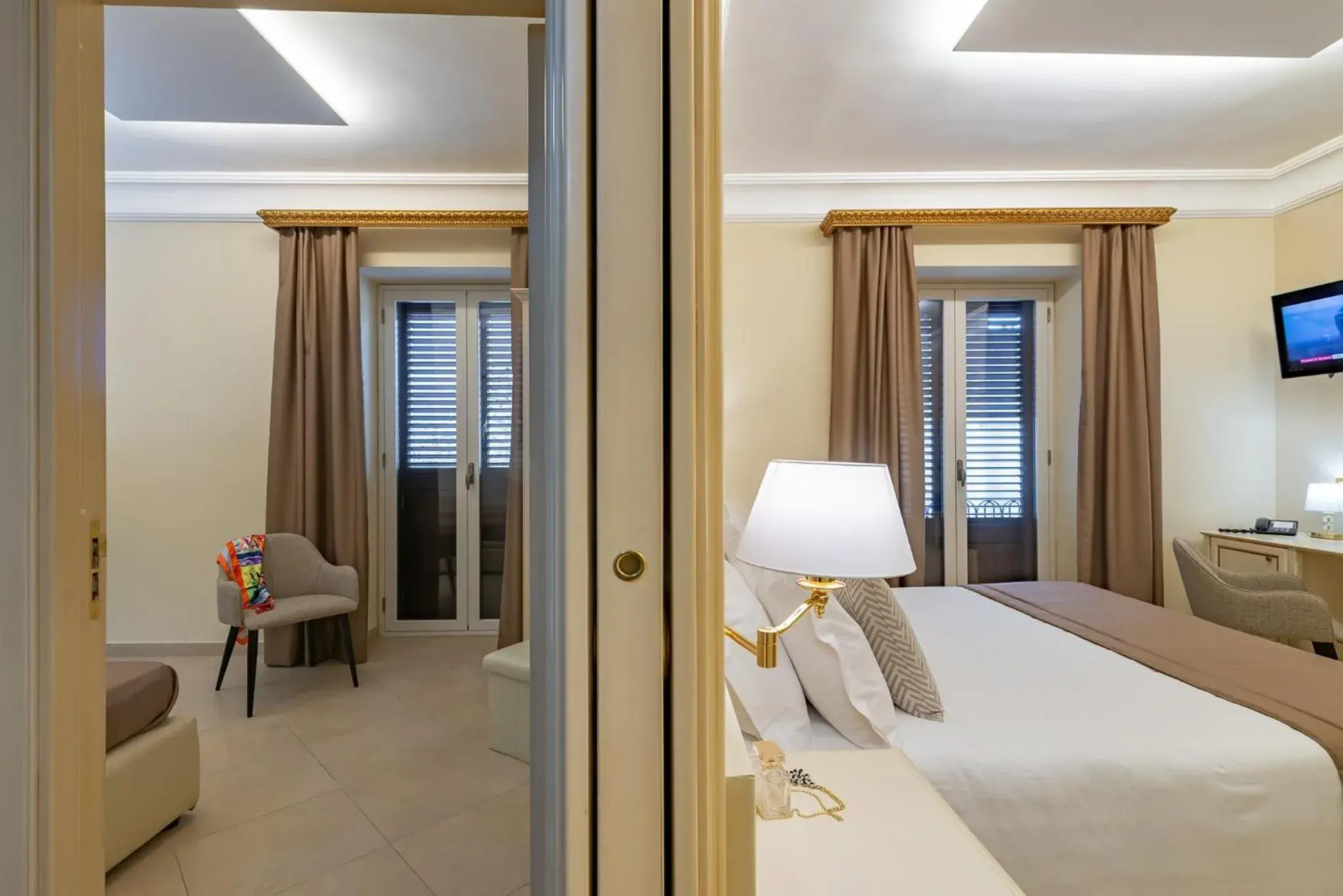 Bed in Vittorio Emanuele Boutique Hotel