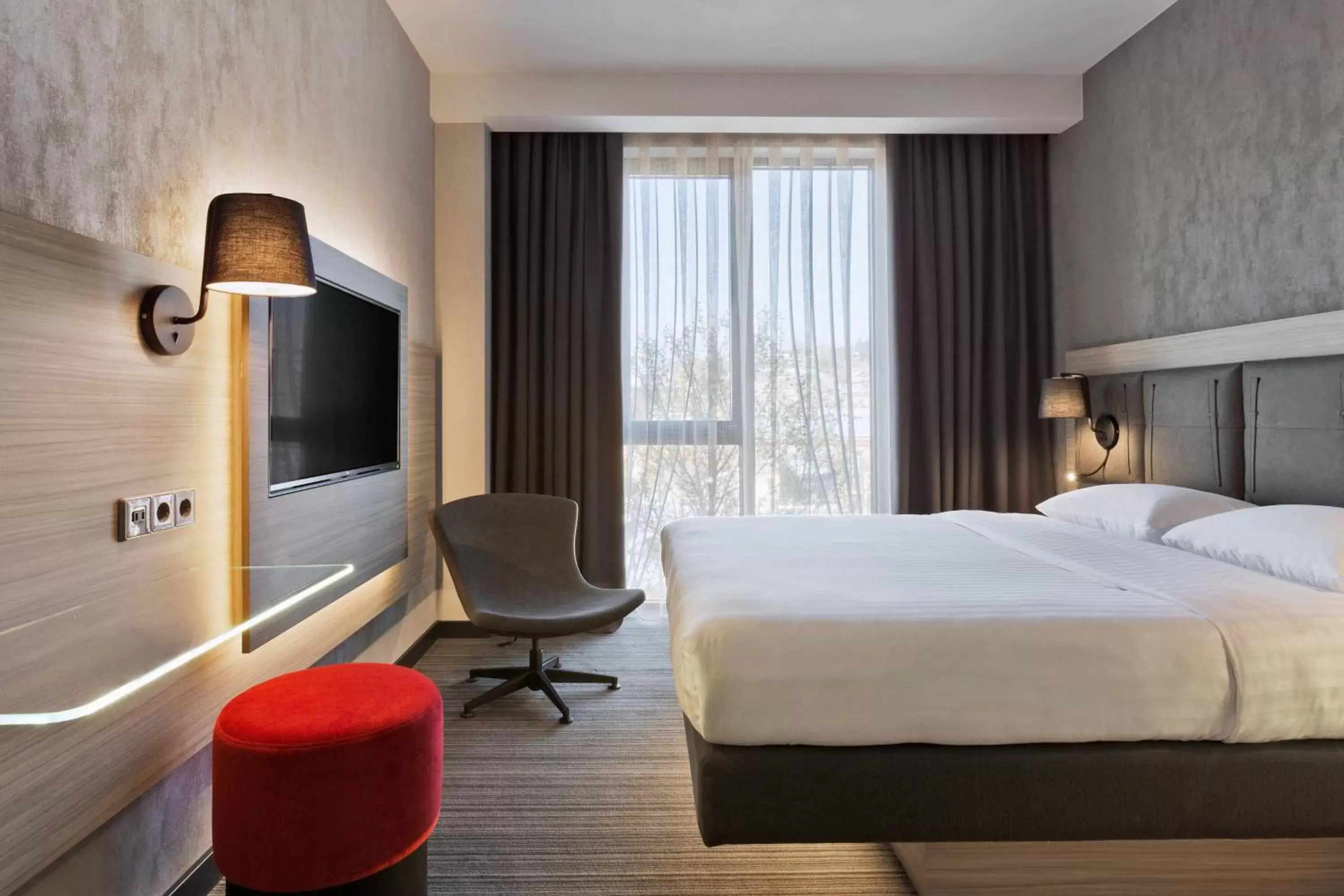 Photo of the whole room, Bed in Moxy by Marriott Tbilisi