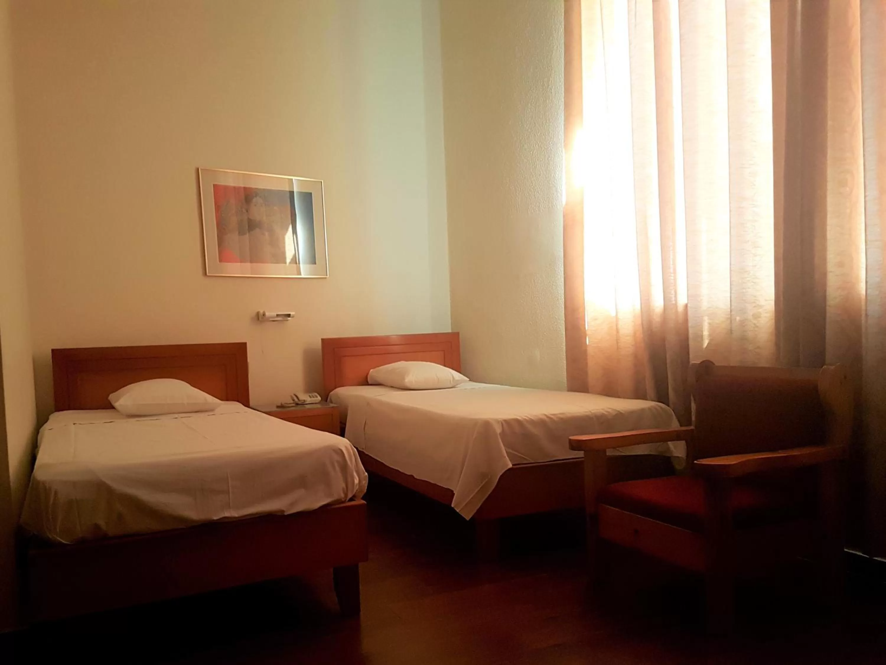 Bedroom, Bed in Lena Hotel