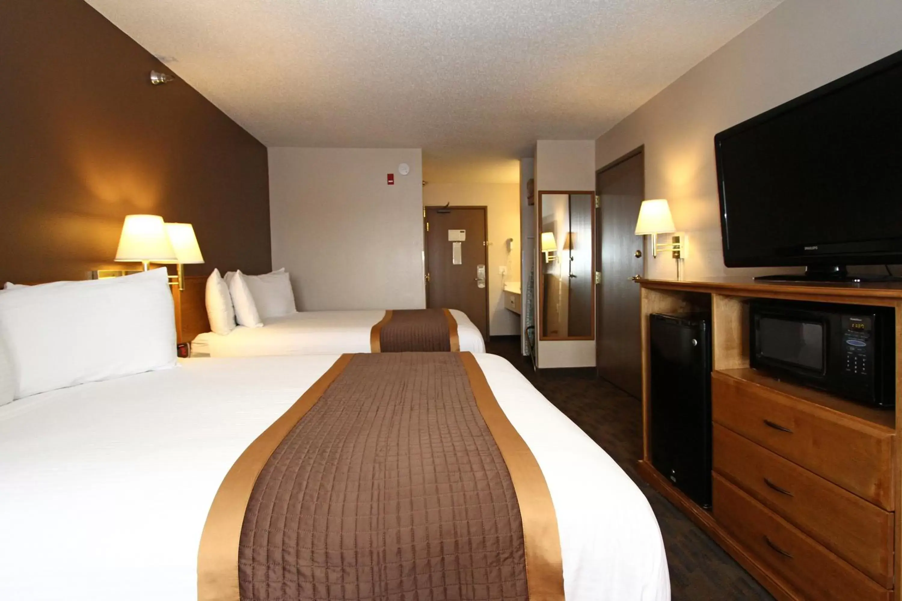 Bedroom in New Victorian Inn & Suites Lincoln