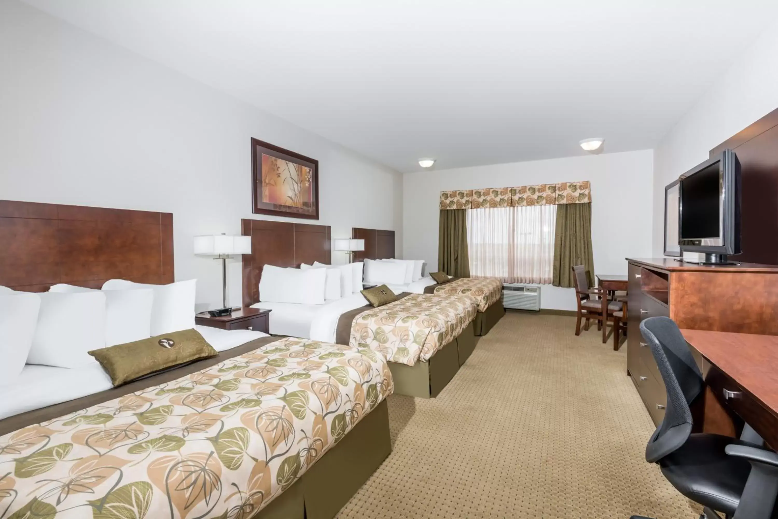 Bed, Room Photo in Ramada by Wyndham Olds
