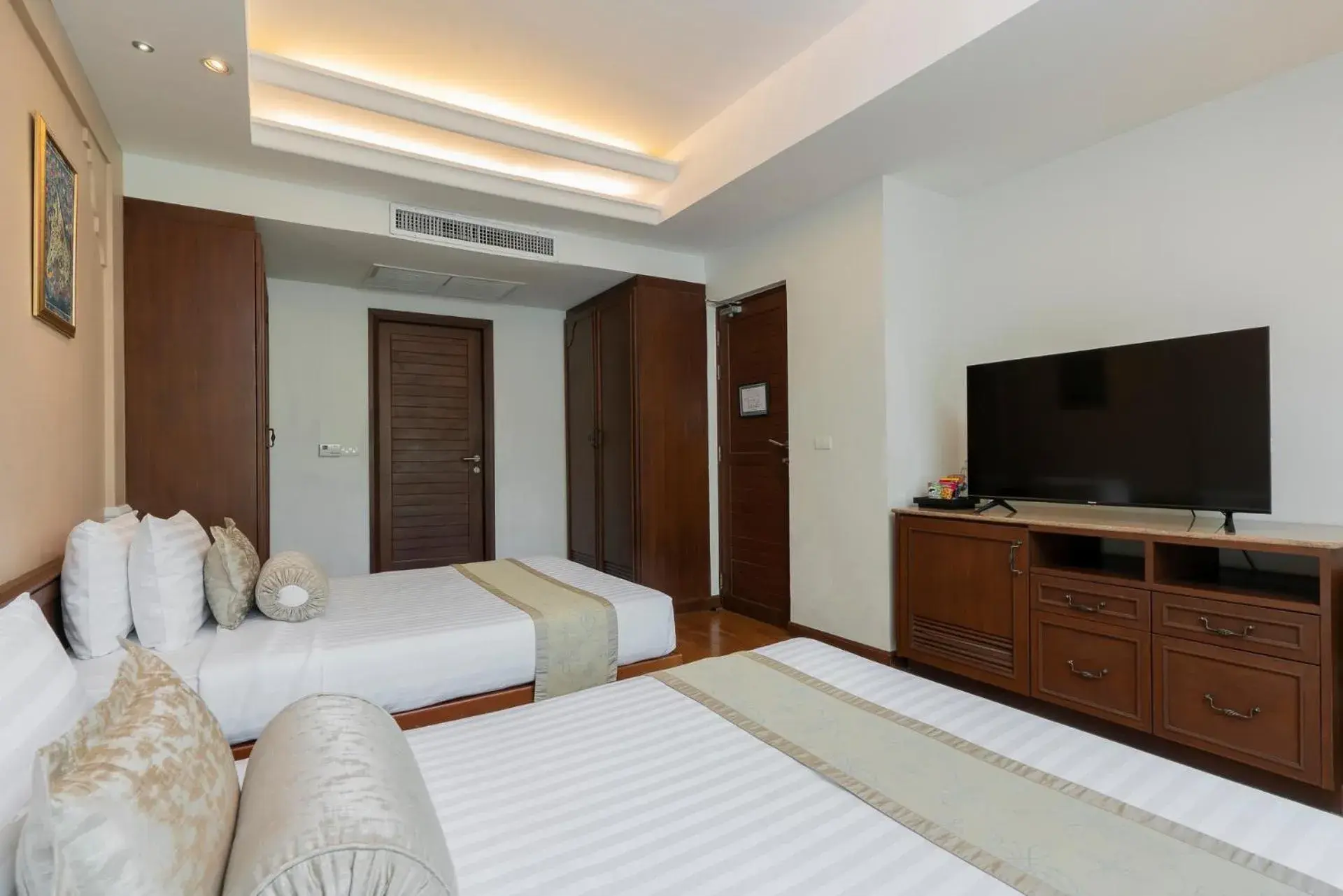 Bedroom, Bed in Ravindra Beach Resort & Spa - SHA Extra Plus