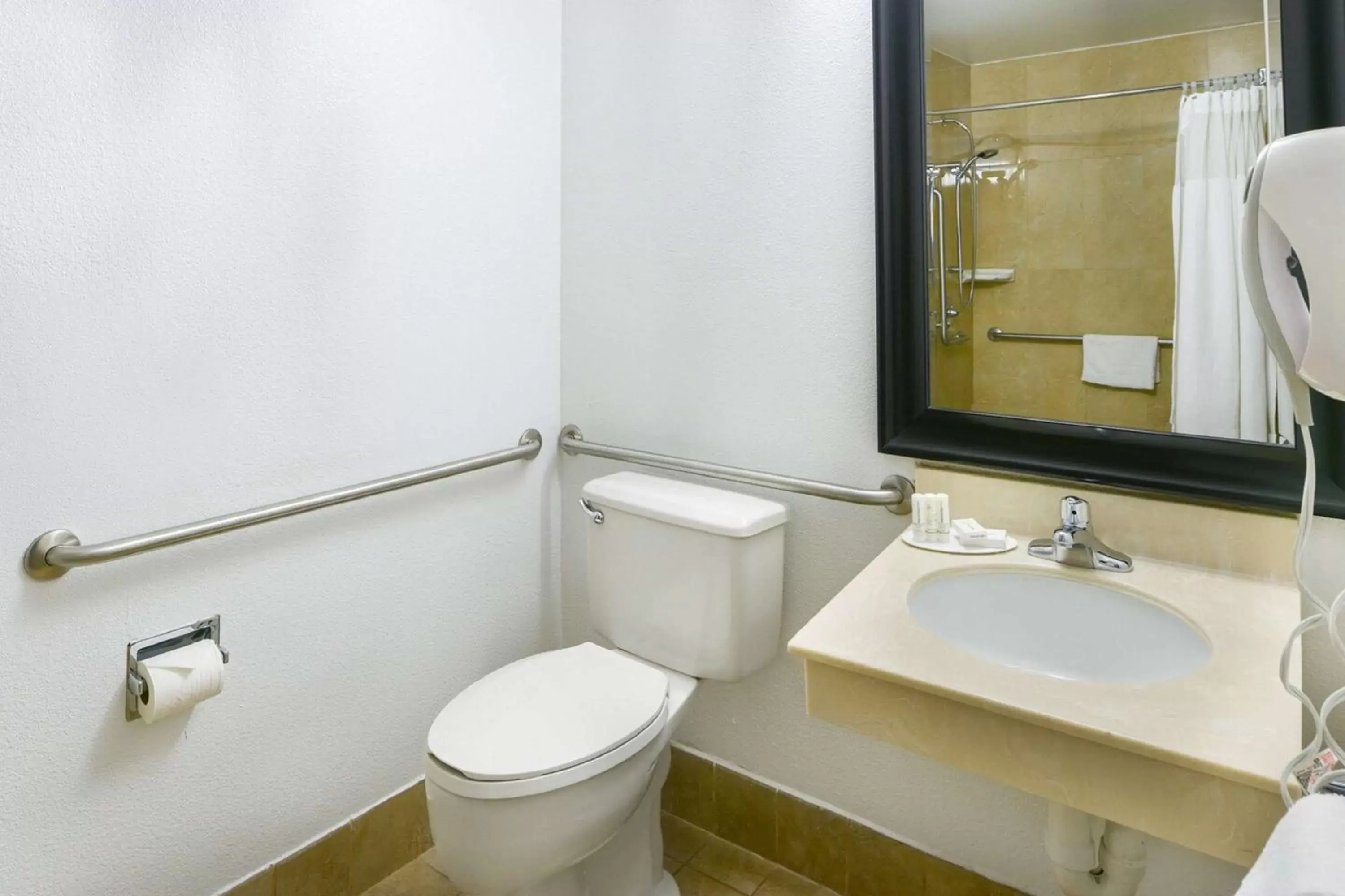 Bathroom in SureStay Hotel by Best Western Ontario Airport