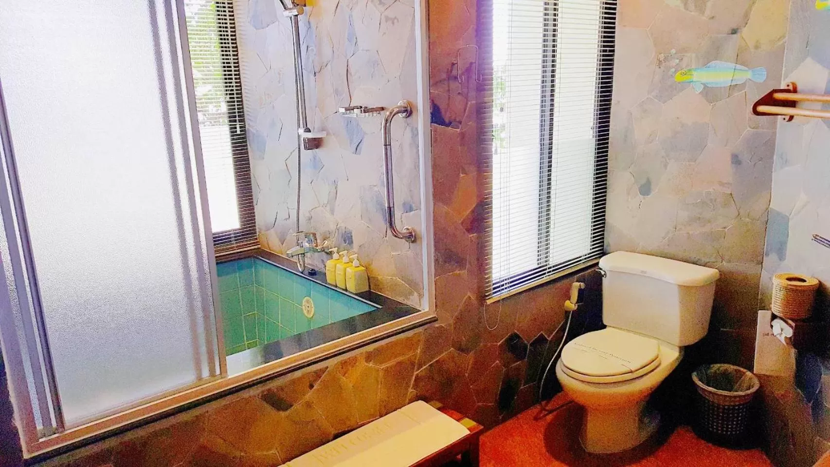 Toilet in Birds and Bees Resort