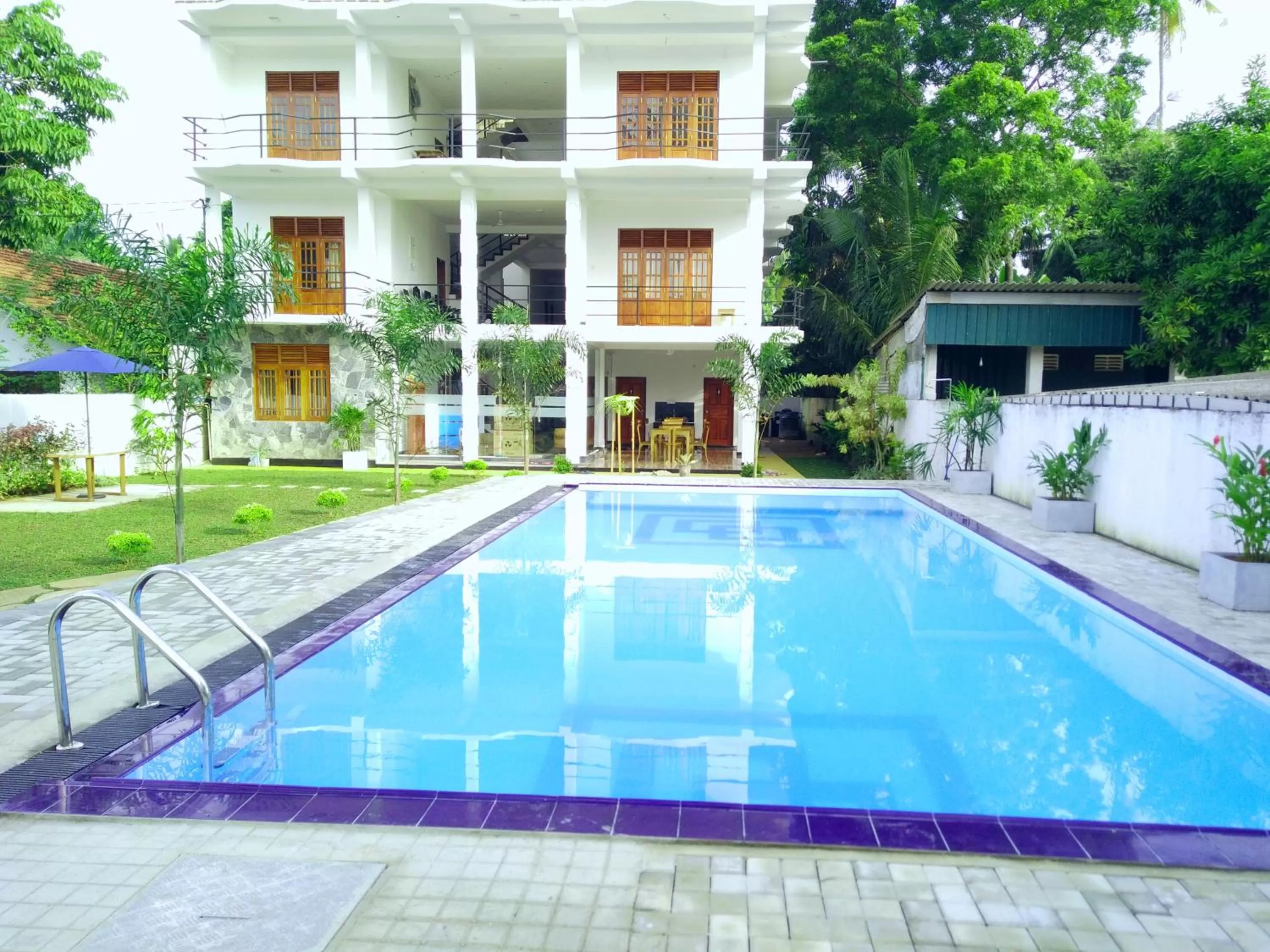 Property building, Swimming Pool in Ocean Bay Surf Resort Weligama