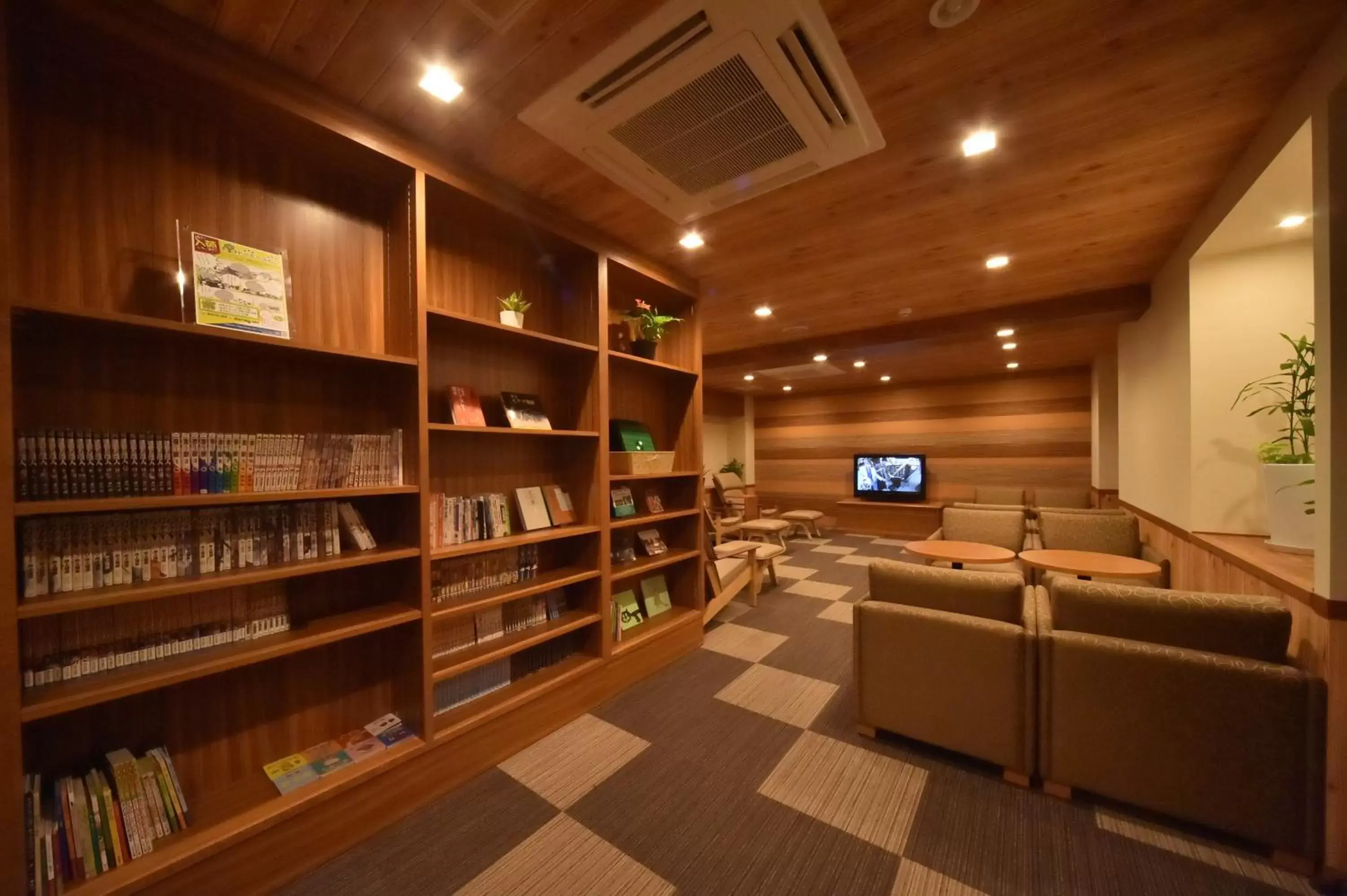 Communal lounge/ TV room, Library in Dormy Inn Premium Sapporo