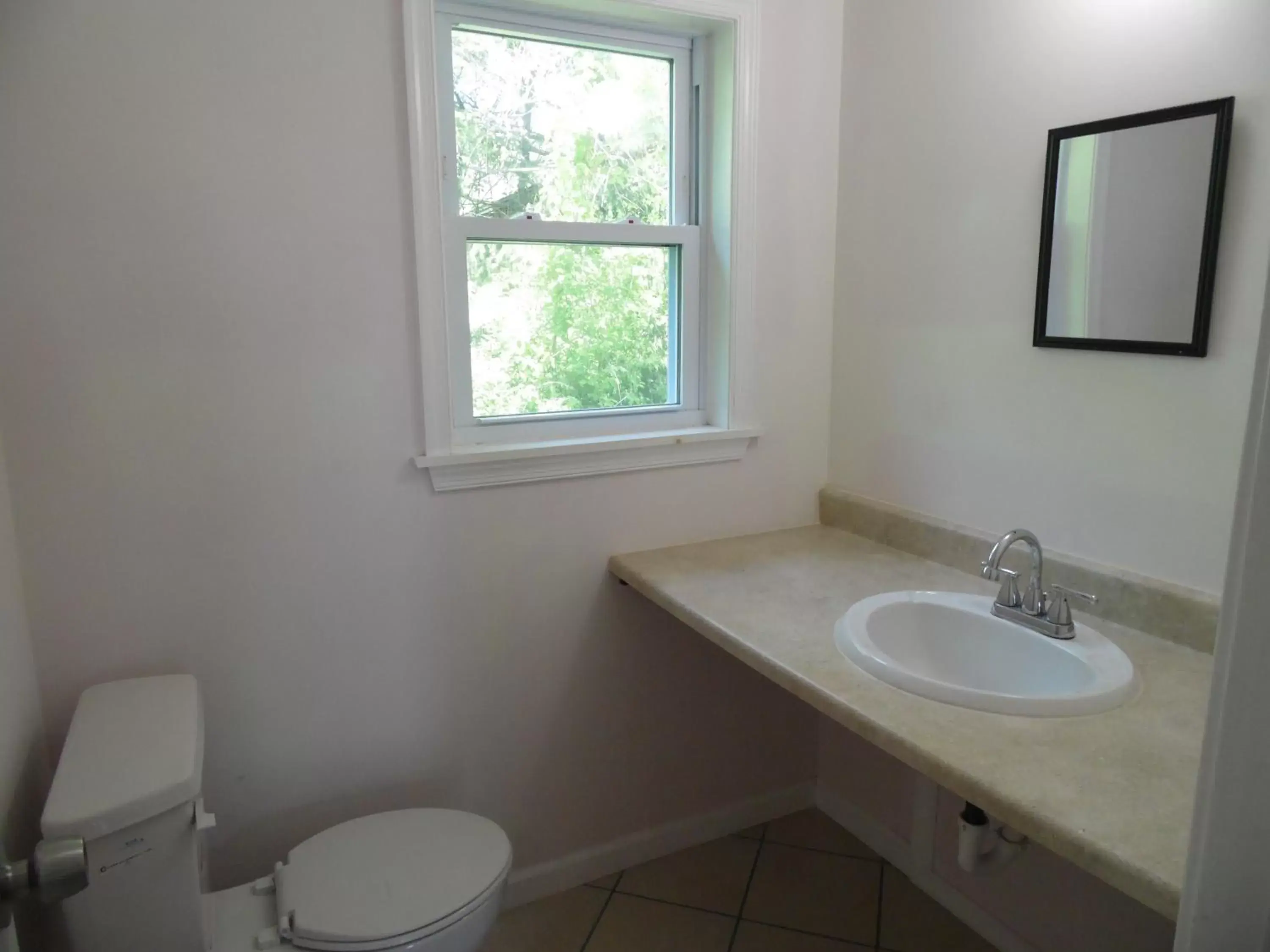 Toilet, Bathroom in Glenwood Inn & Conference Center