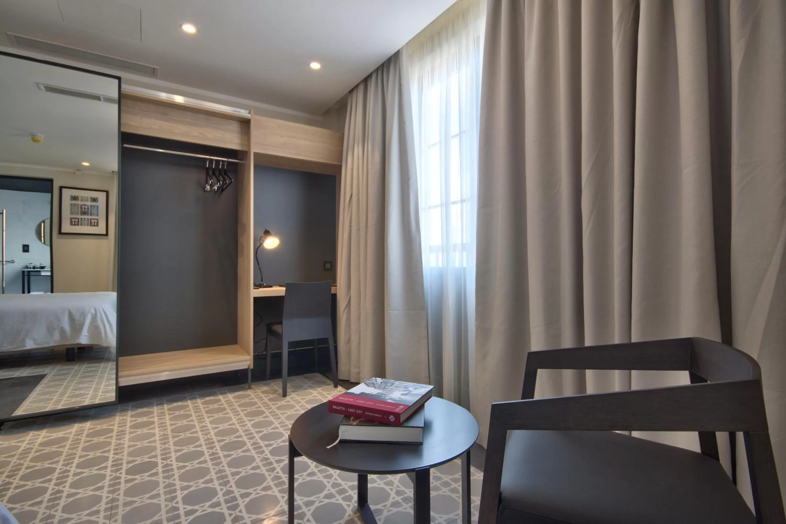 Bed in La Falconeria Hotel